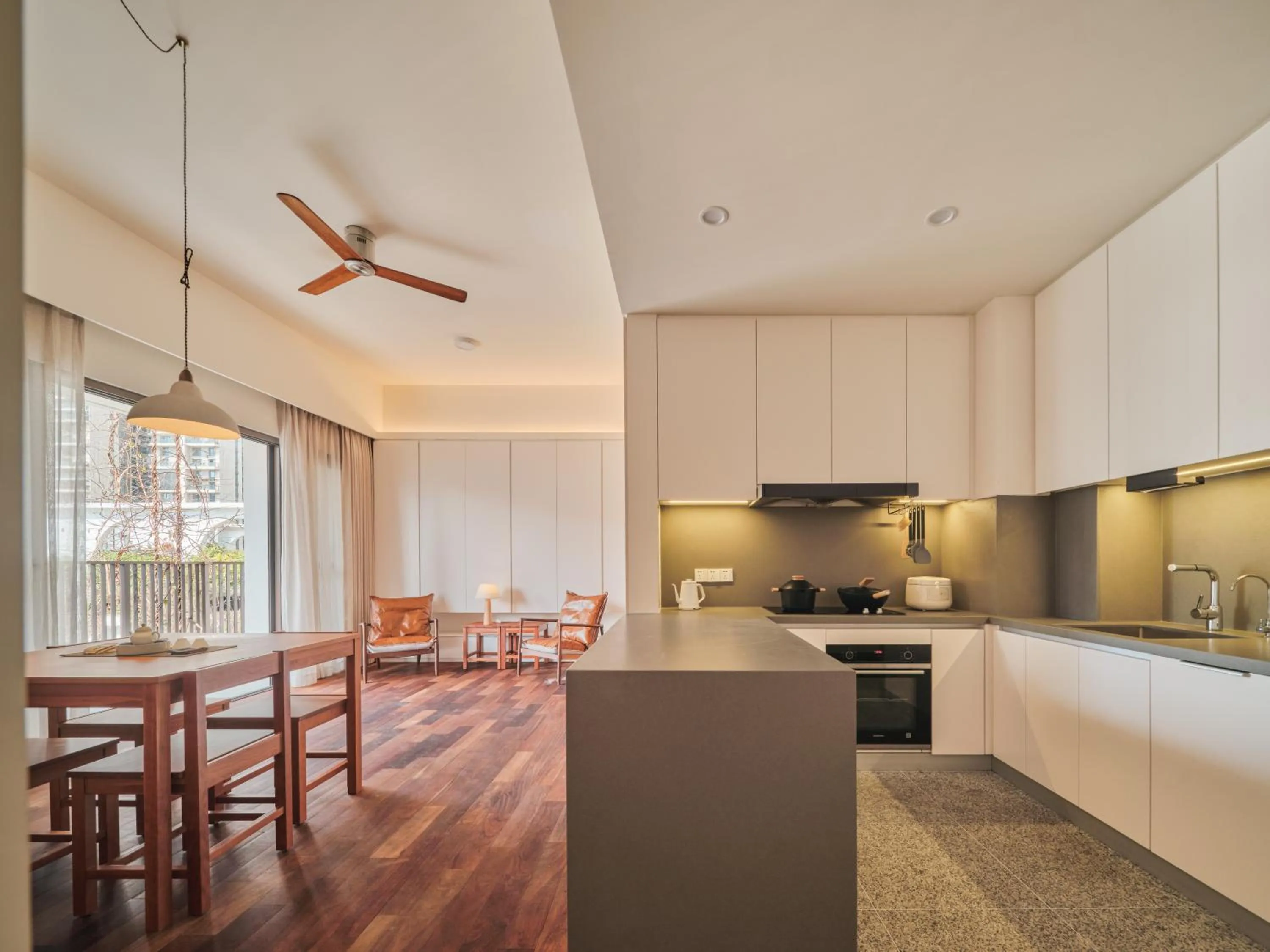 Kitchen or kitchenette in Wutong Hotel Apartment Bao'an Center