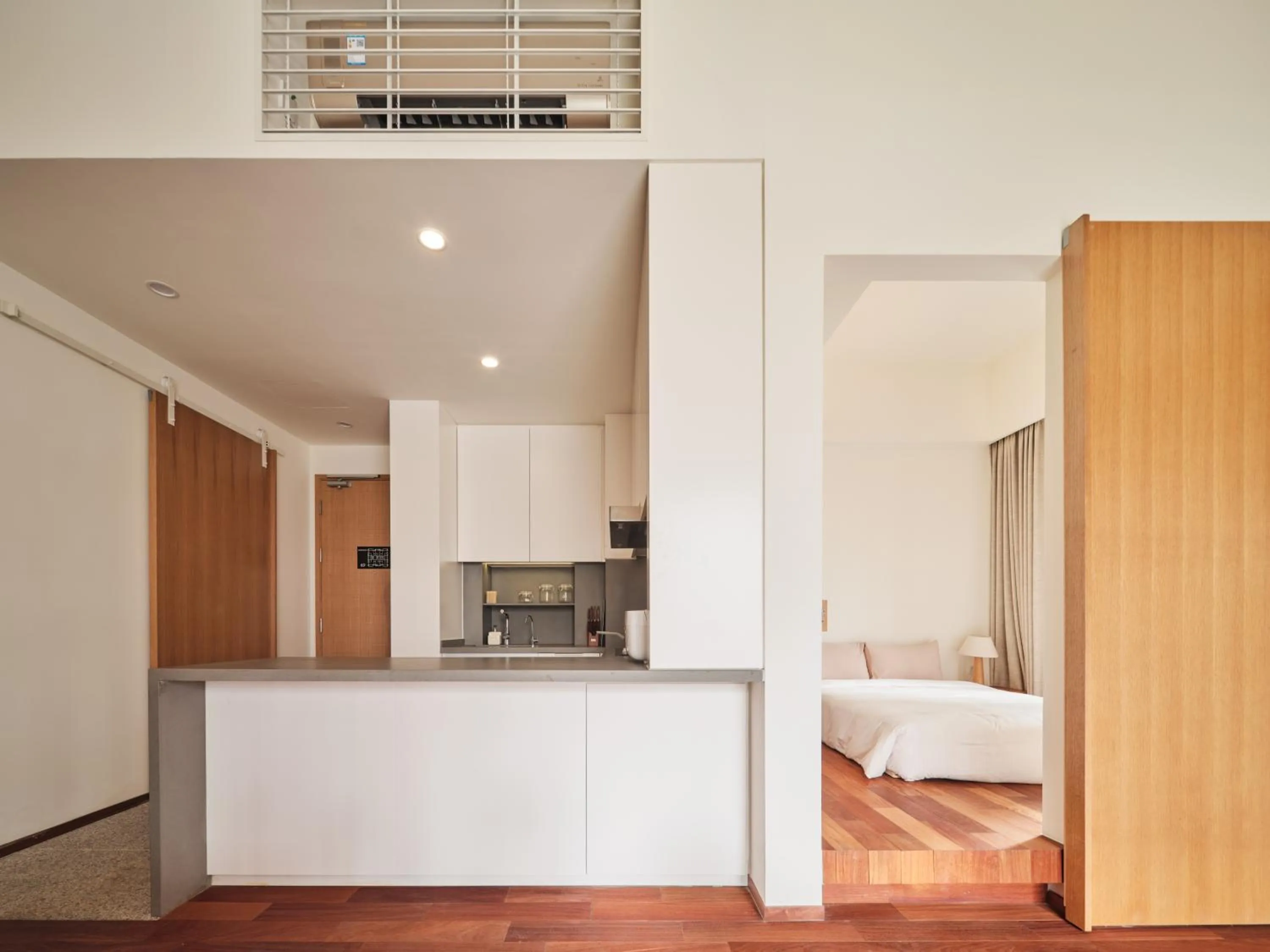 Photo of the whole room, Bed in Wutong Hotel Apartment Bao'an Center