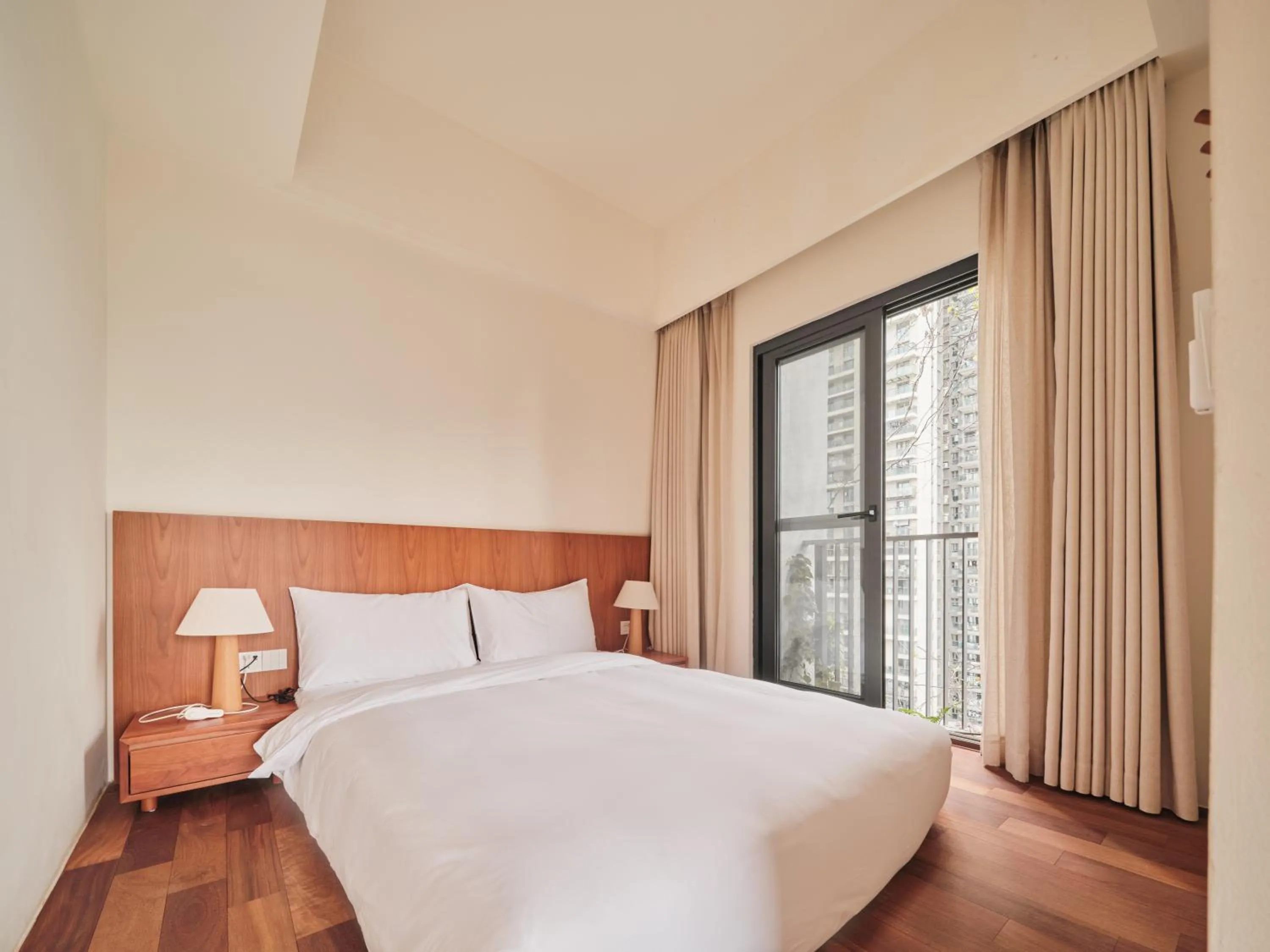 Bedroom, Bed in Wutong Hotel Apartment Bao'an Center