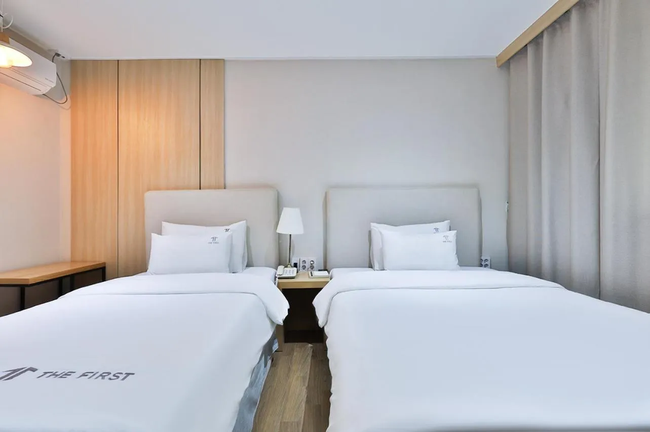 Bed in The First Hotel