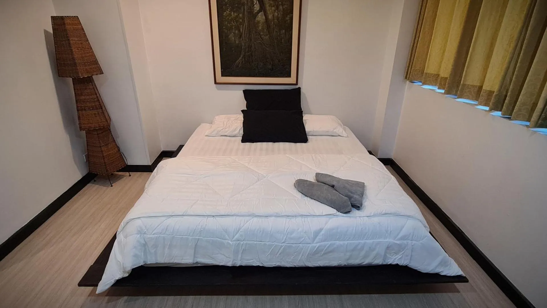 Bed in DonMueang station hotel