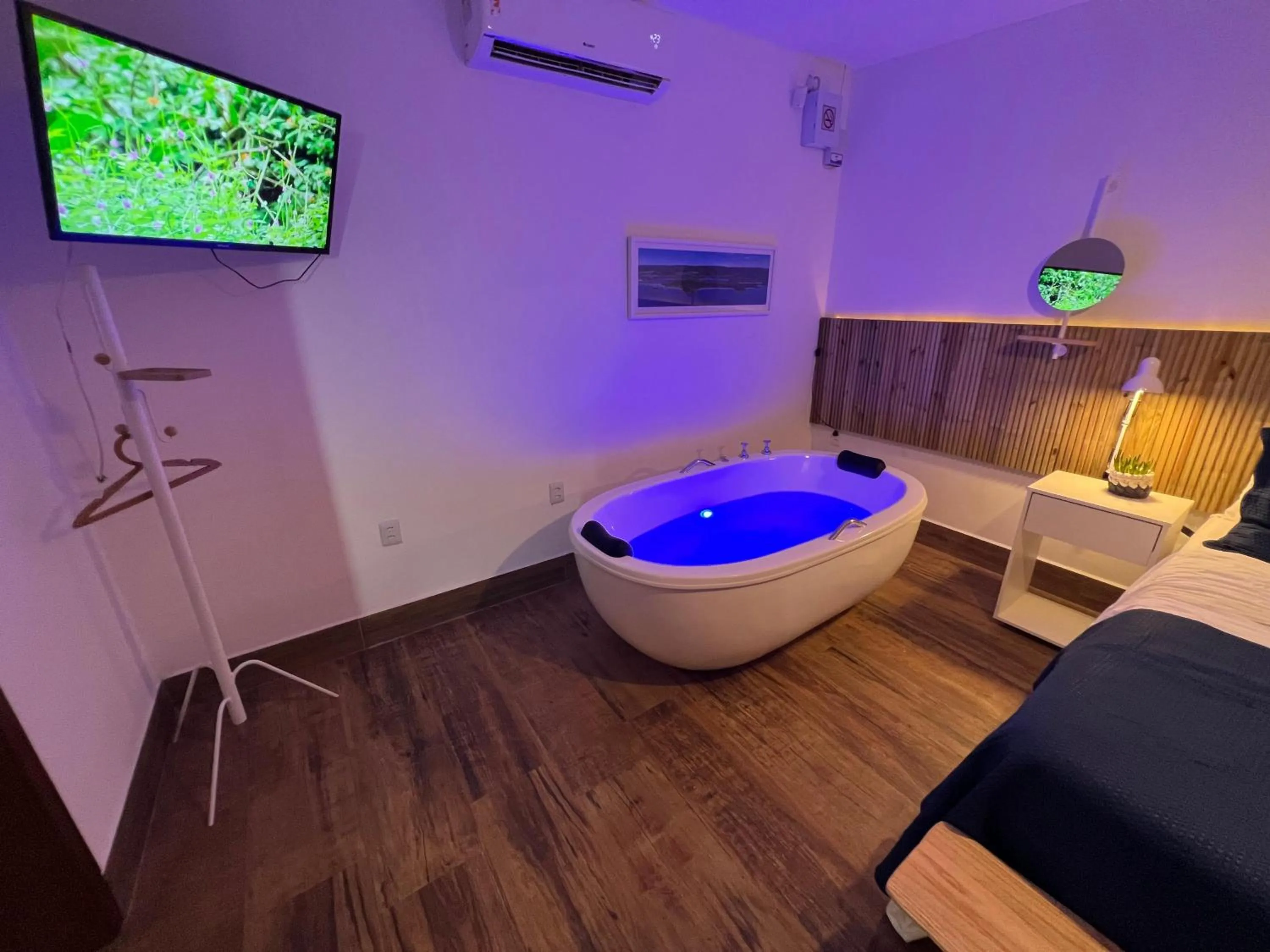 Bed in Chalés e Bangalôs Ibiraquera