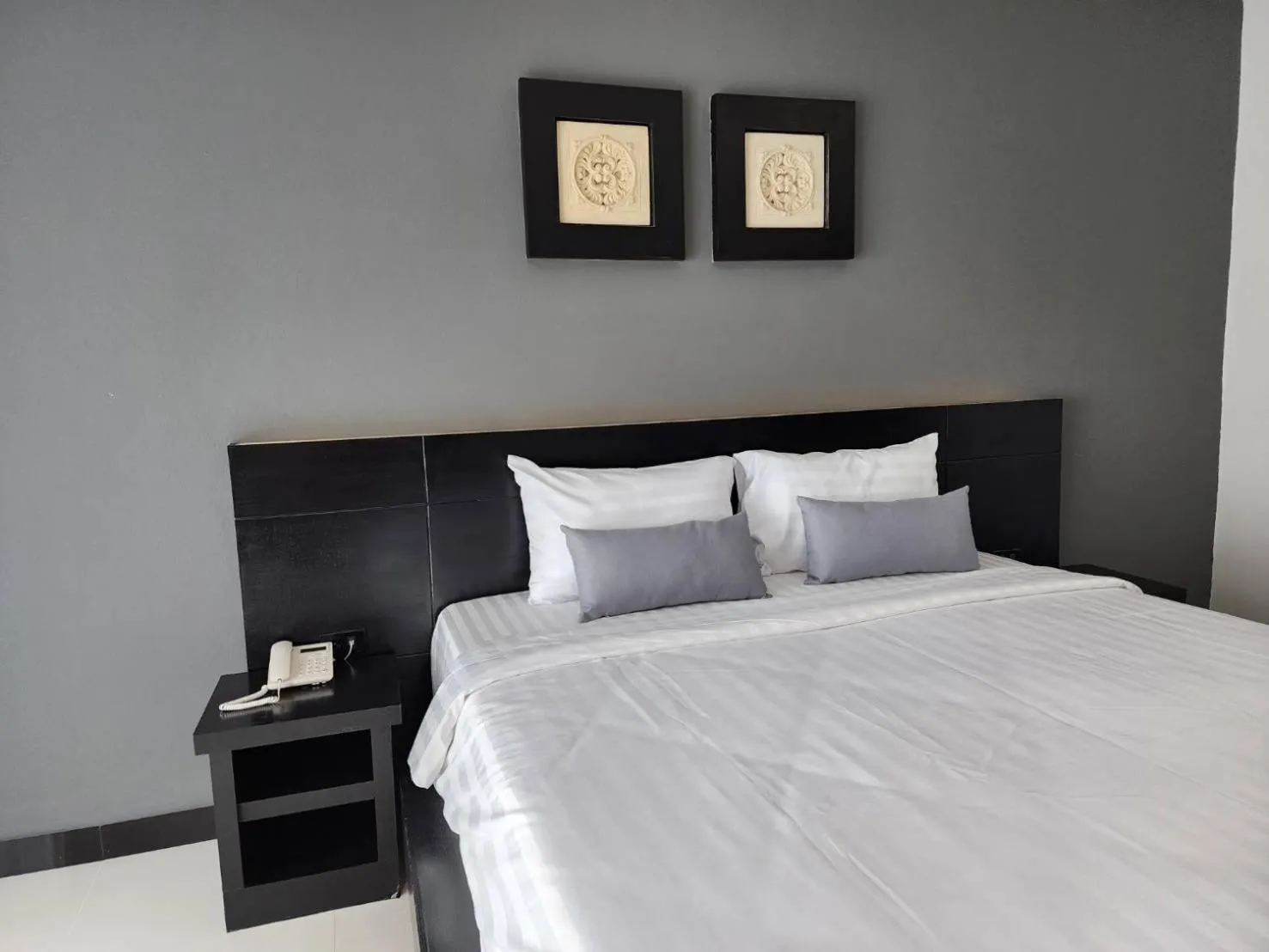 Bed in LHC HOTEL AND RESORT