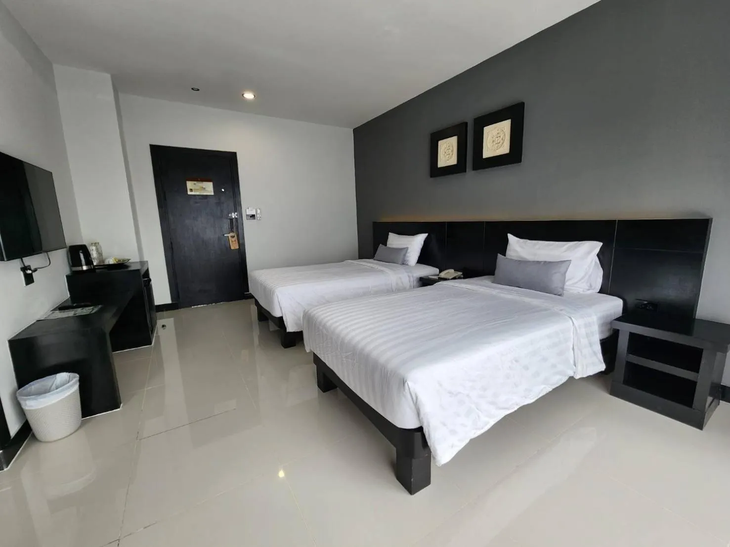 Bed in LHC HOTEL AND RESORT