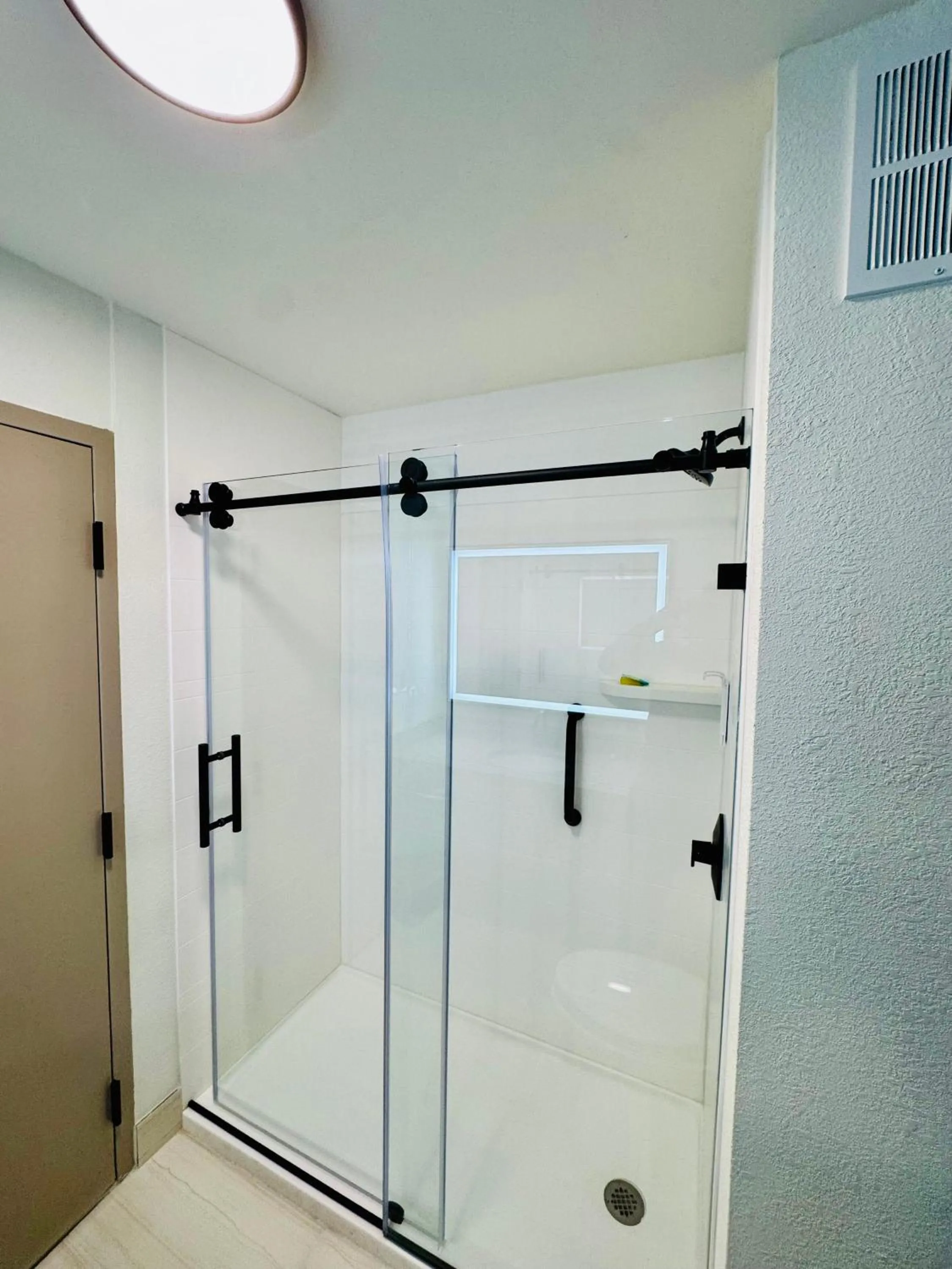 Shower in Days Inn by Wyndham Manassas
