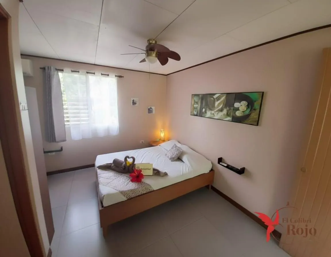 Bed in Hotel El Colibri Rojo