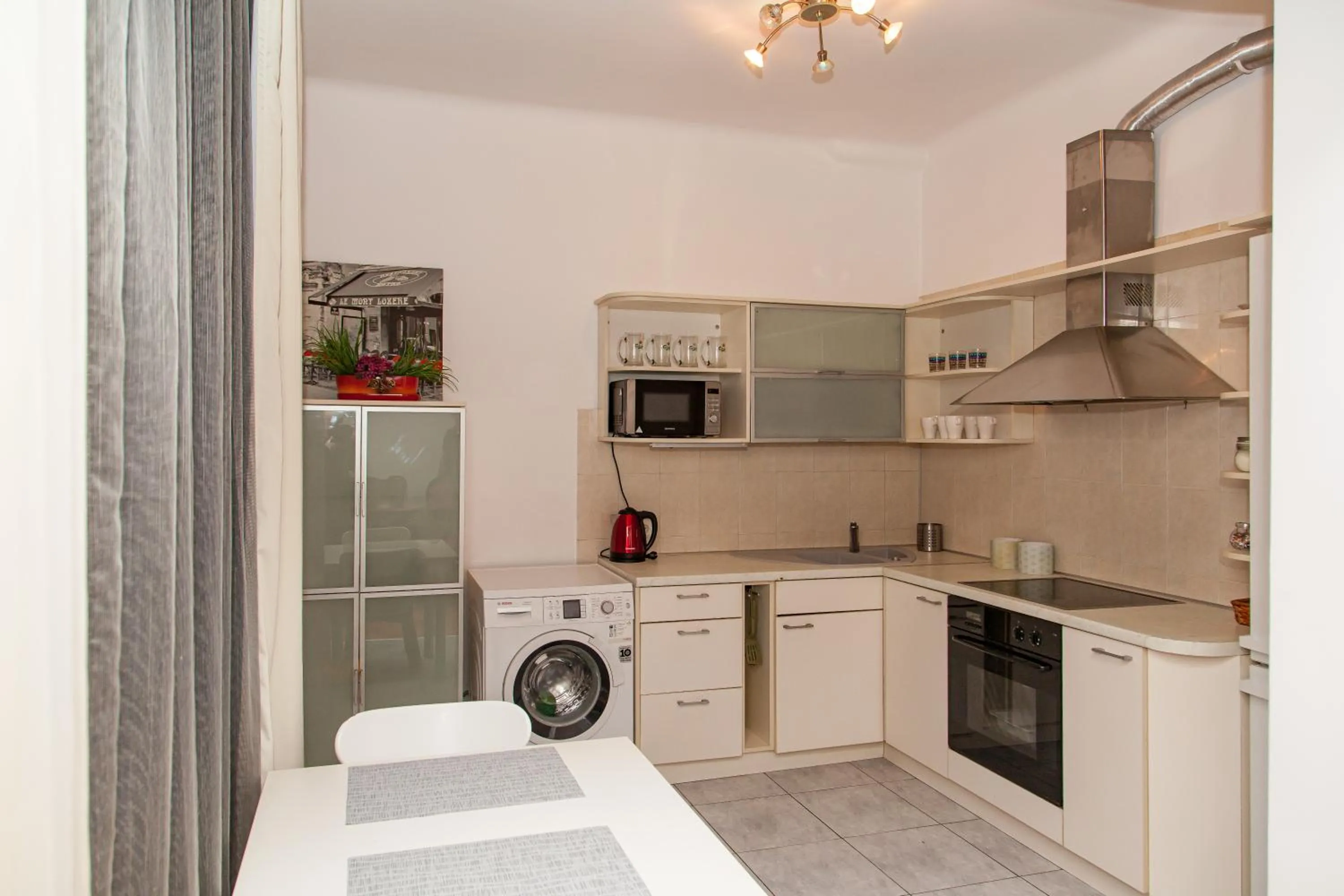 Kitchen or kitchenette in KaunasInn - AM
