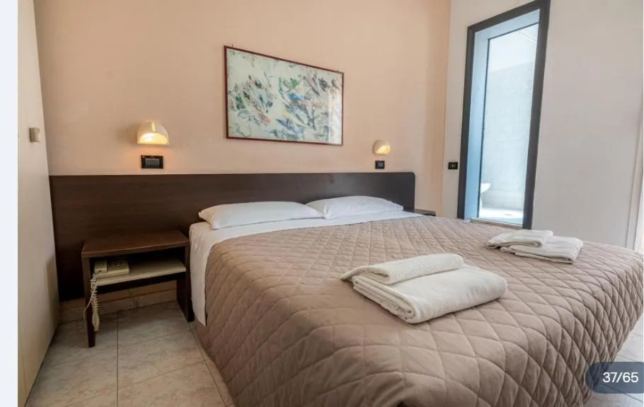 Bed in Hotel Villa Dina