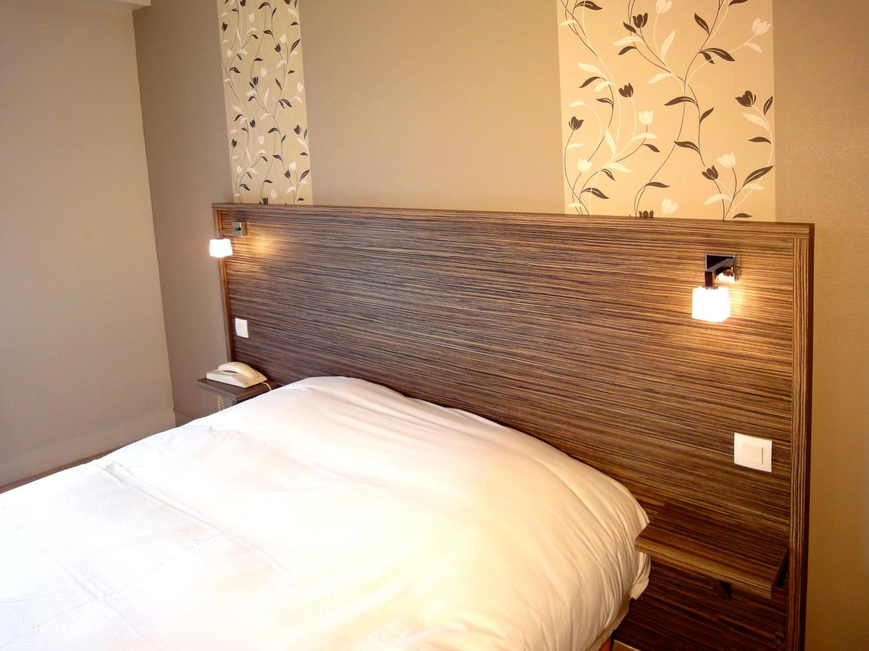 Bed in Hotel les Pecheurs