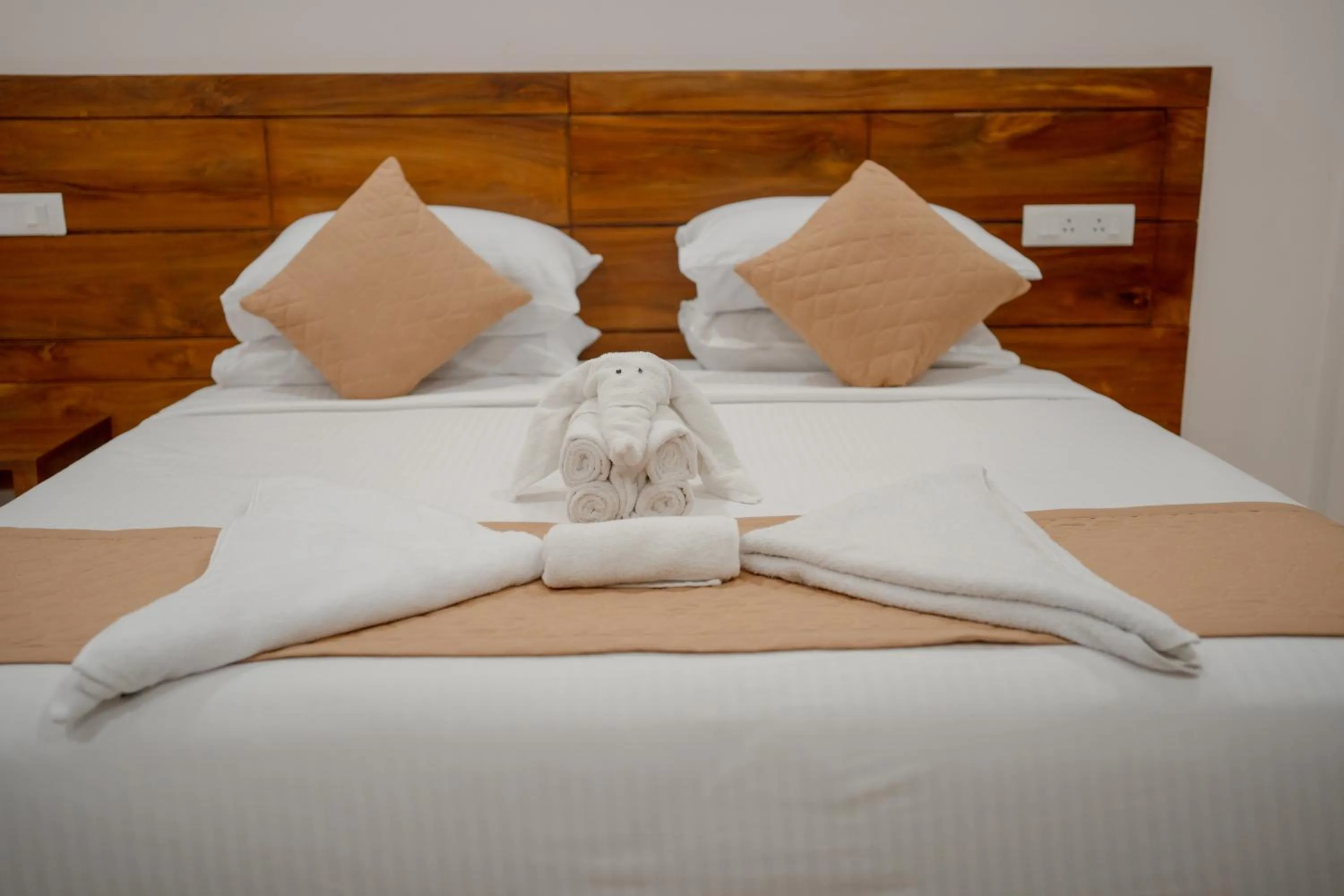 Bed in Daffodils Luxury Airport Suites