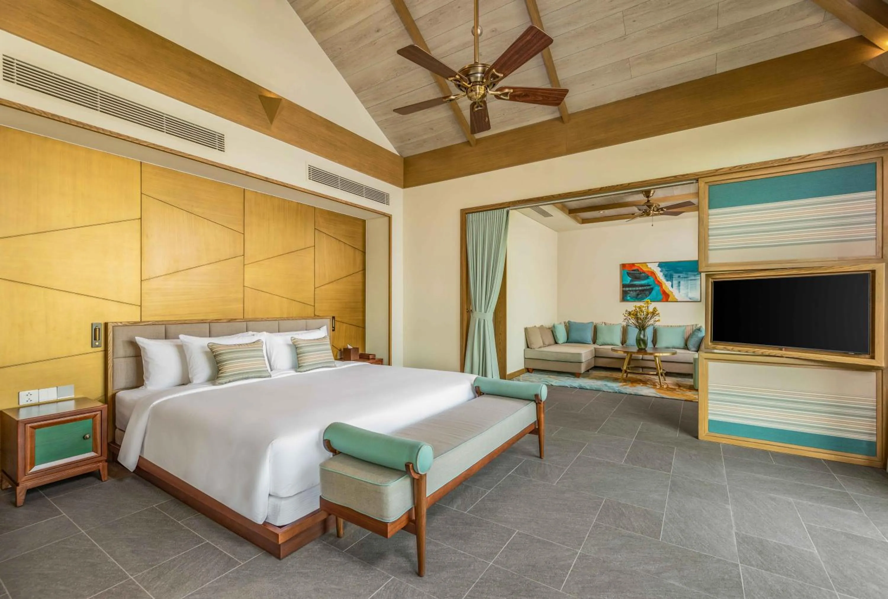 Bed in Fusion Resort and Villas Da Nang