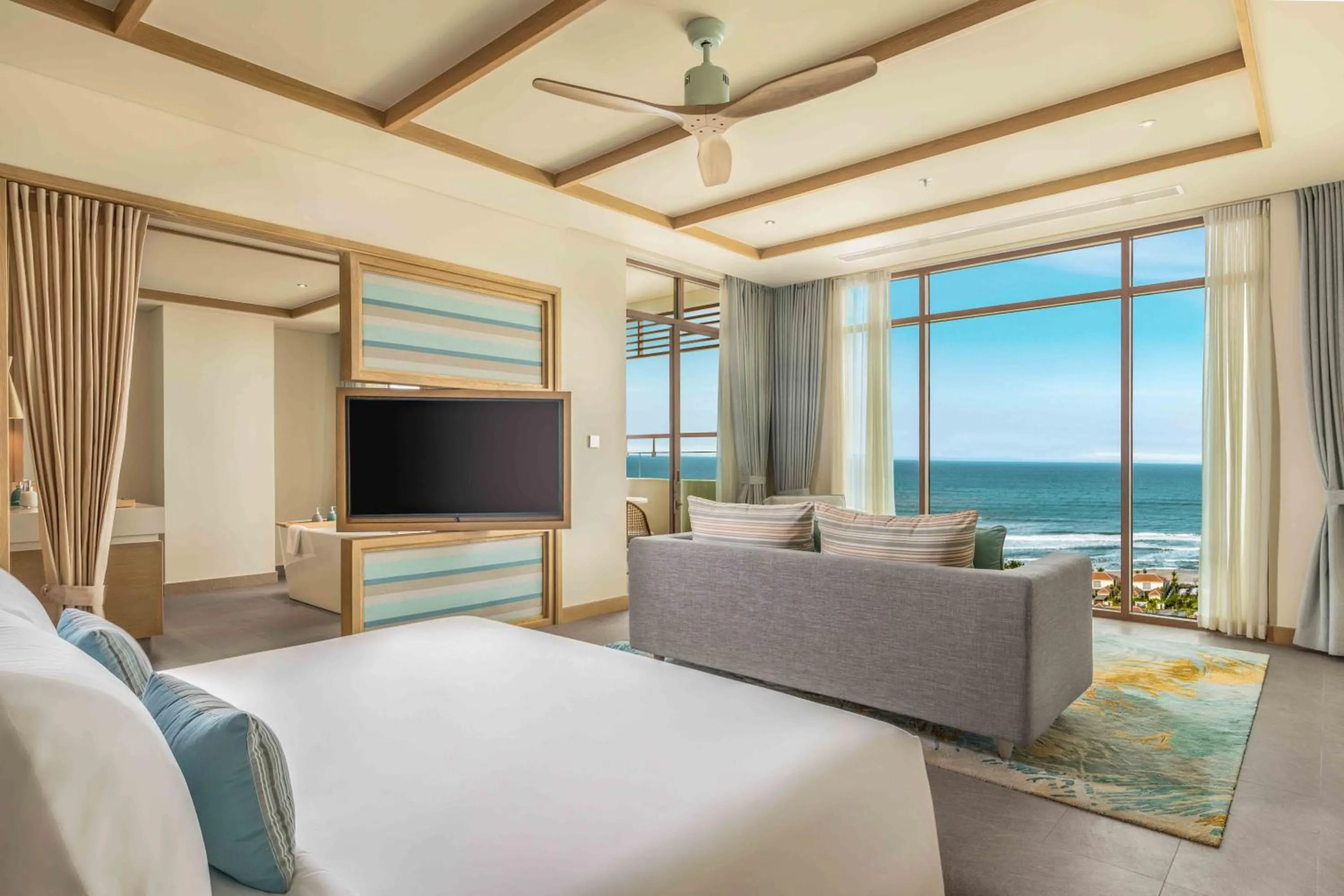 Bed in Fusion Resort and Villas Da Nang