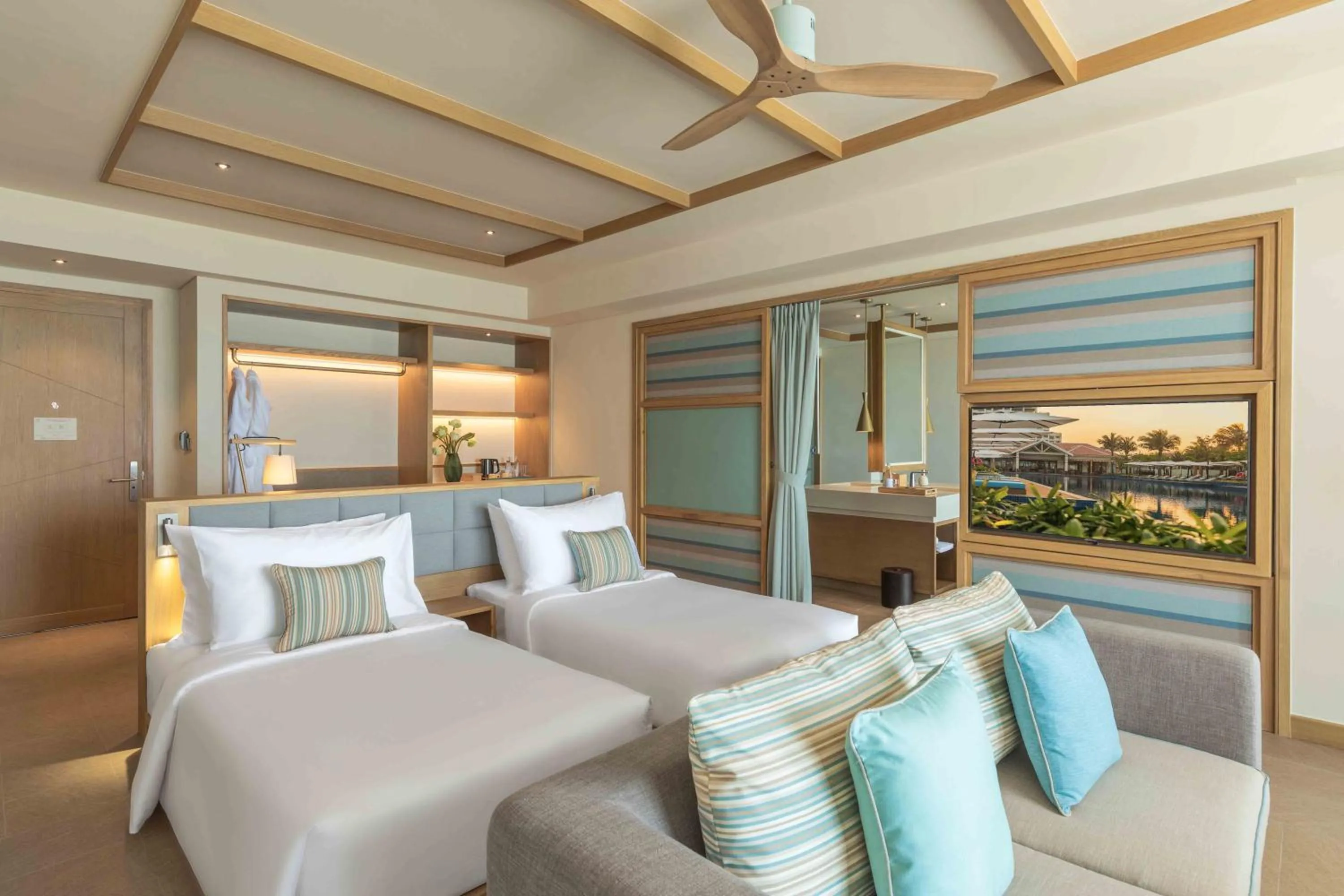 Bed in Fusion Resort and Villas Da Nang