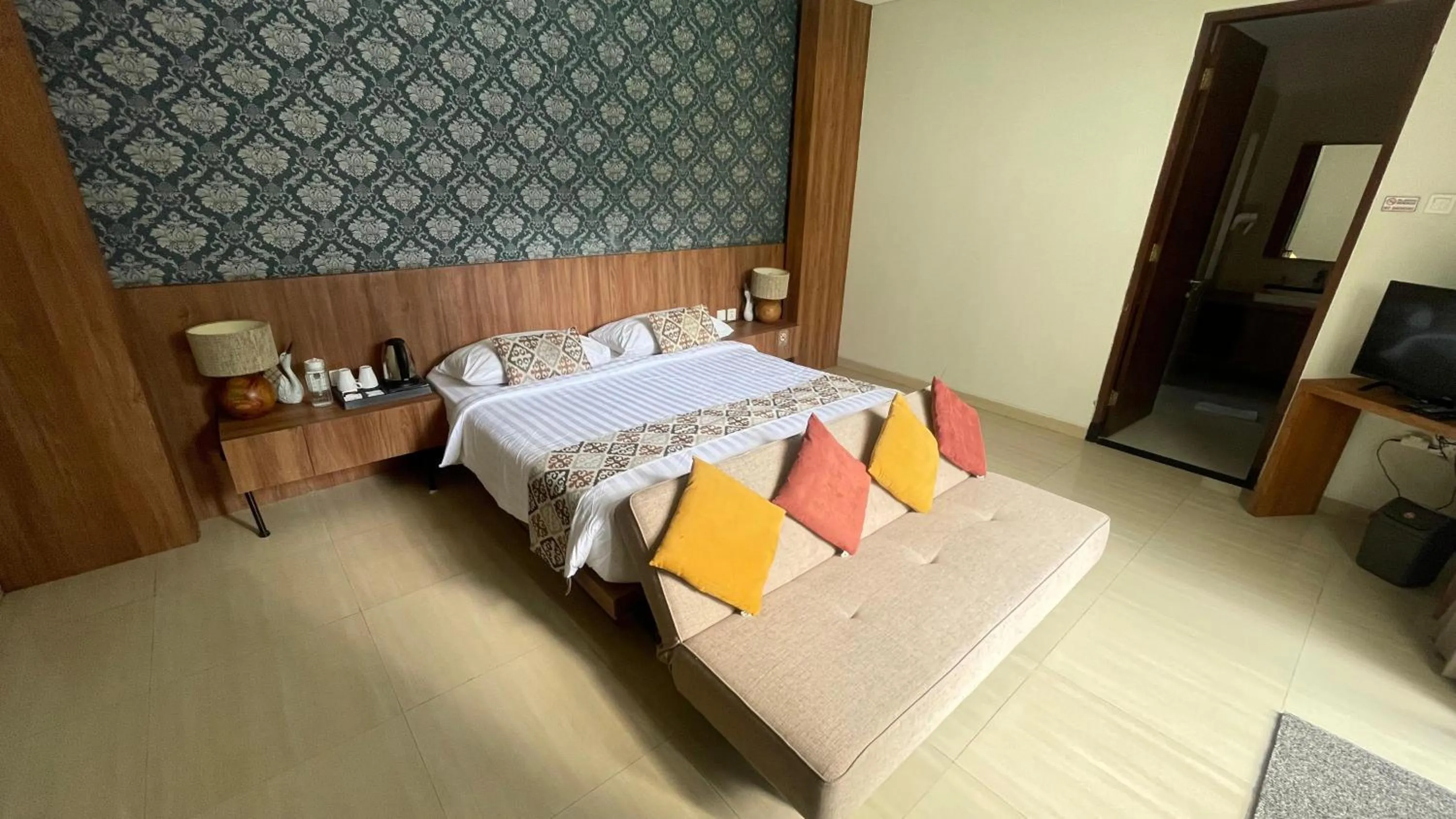 Bed in The BALIem Villa