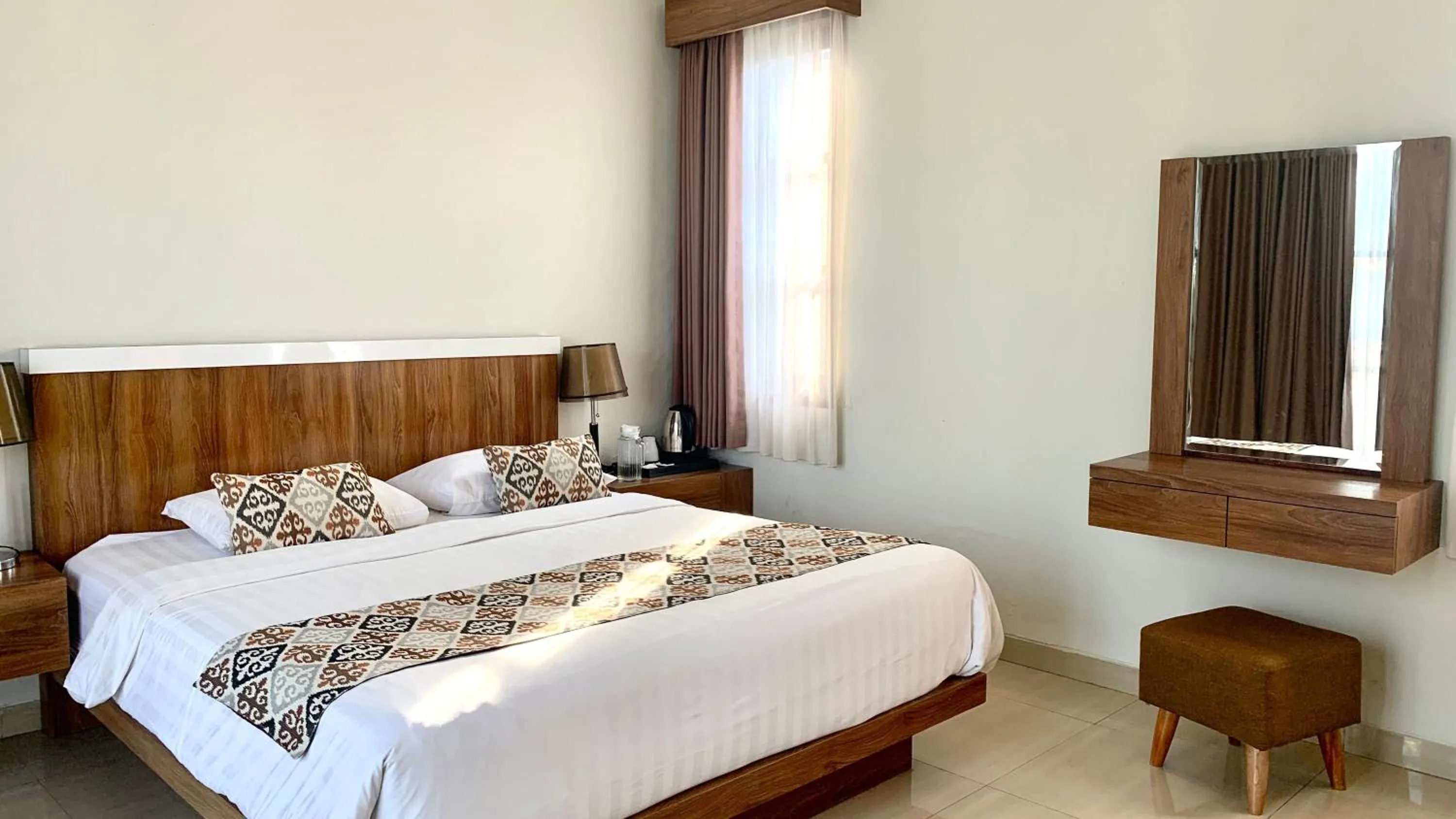 Bed in The BALIem Villa