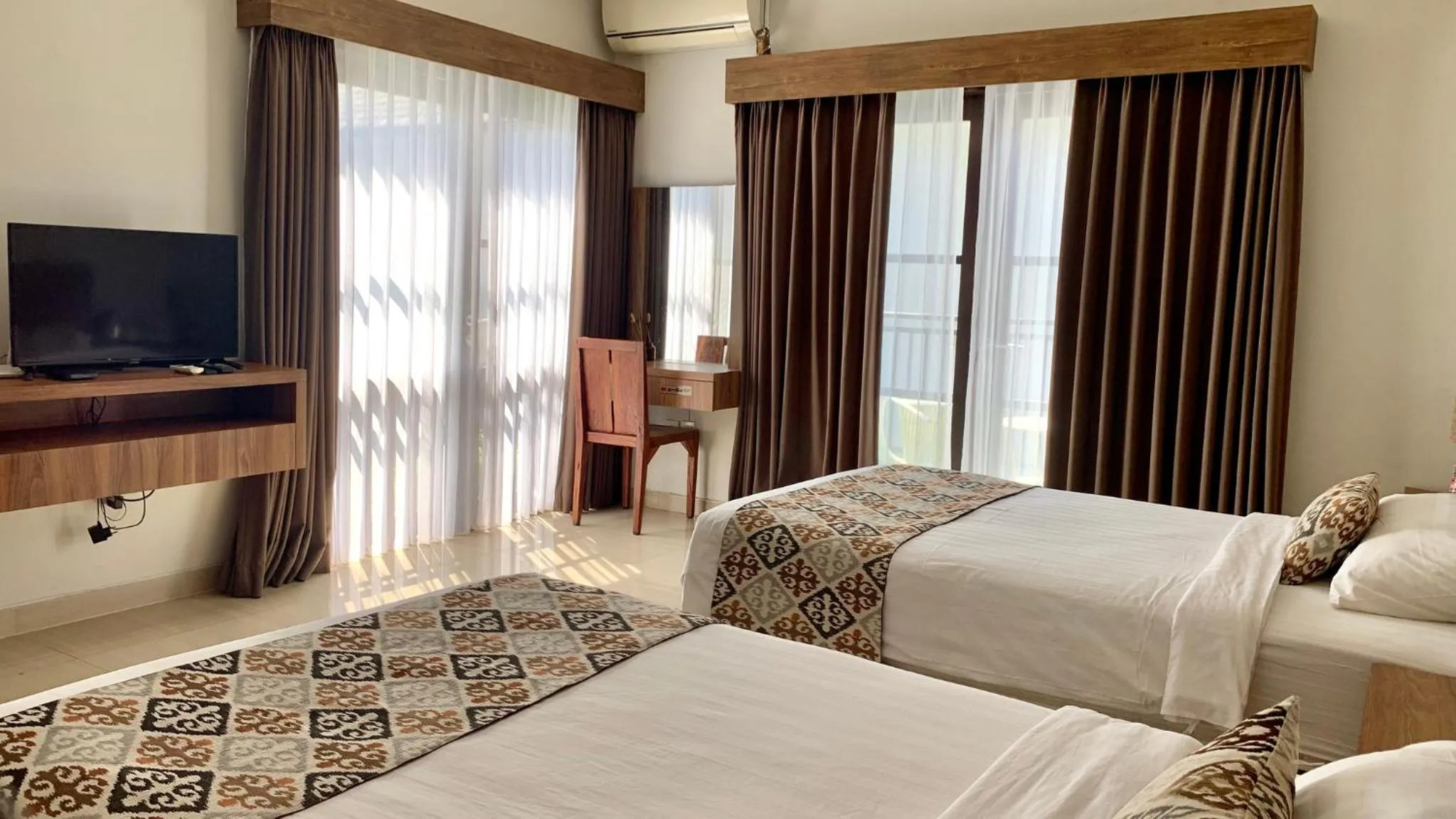 Bed in The BALIem Villa