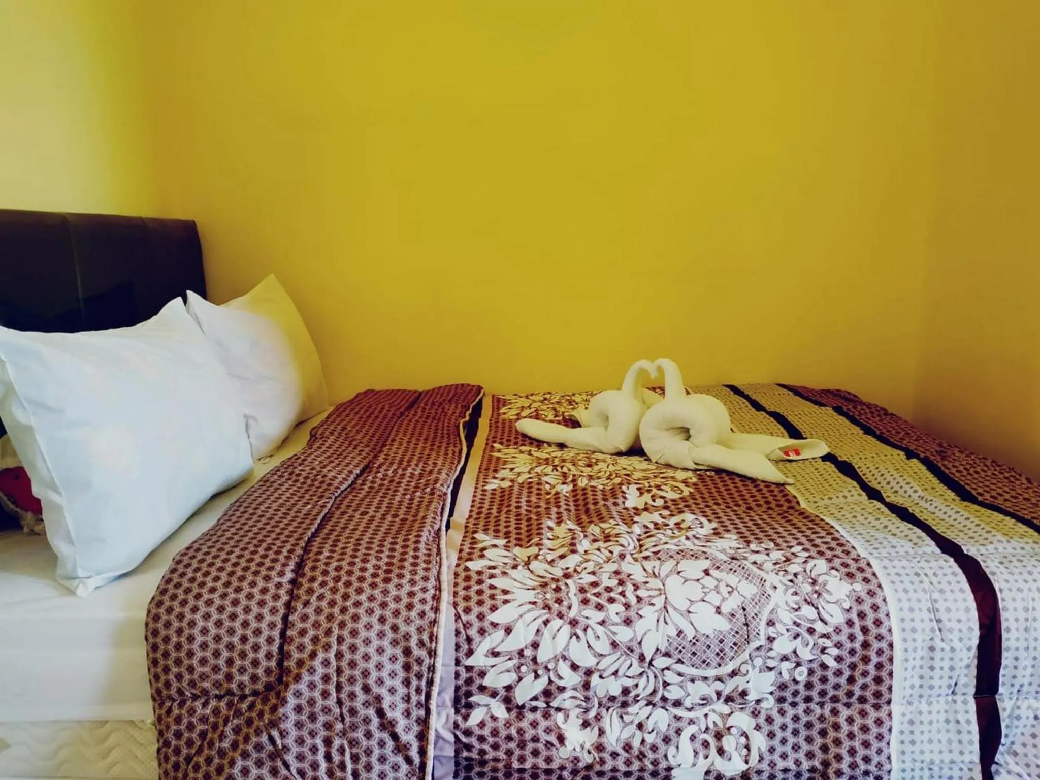 Bed in FIFAWIND HOTEL