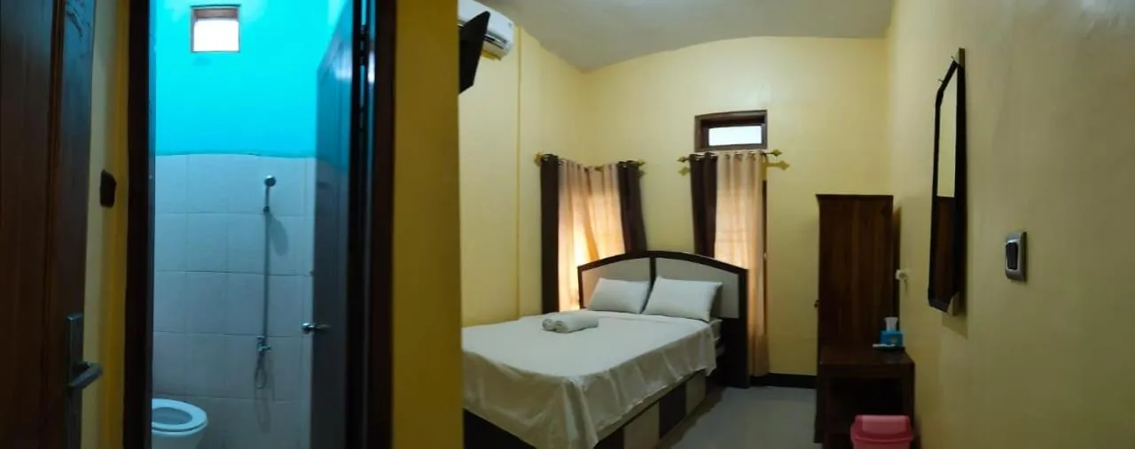 Bed in FIFAWIND HOTEL