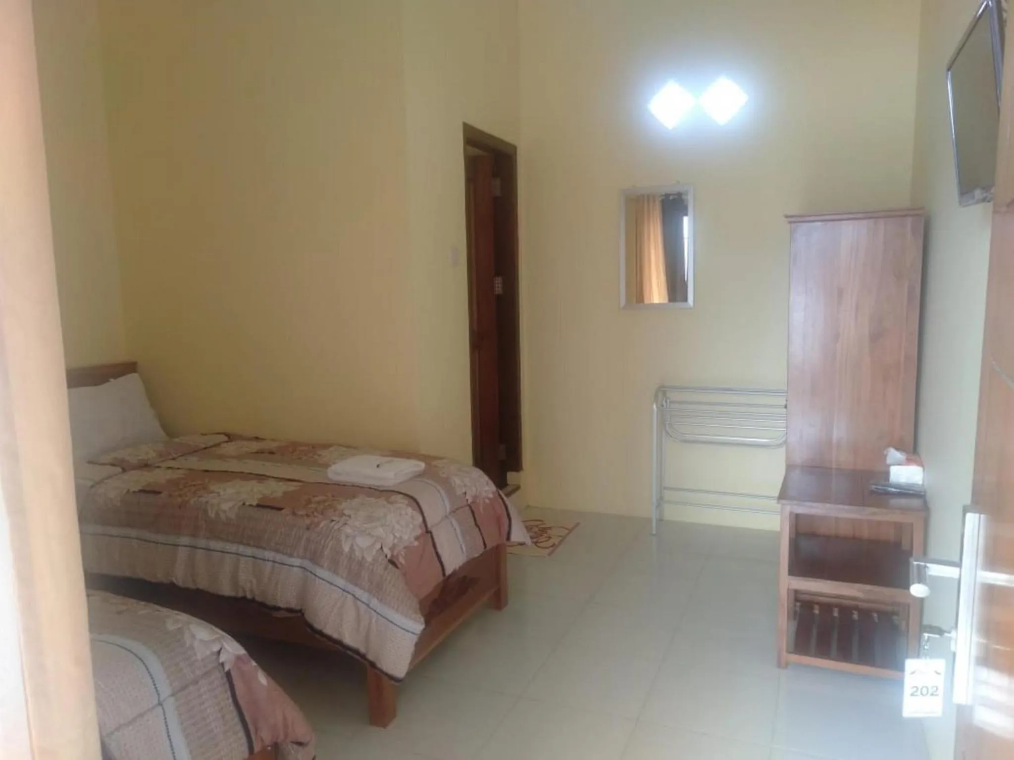 Bed in FIFAWIND HOTEL