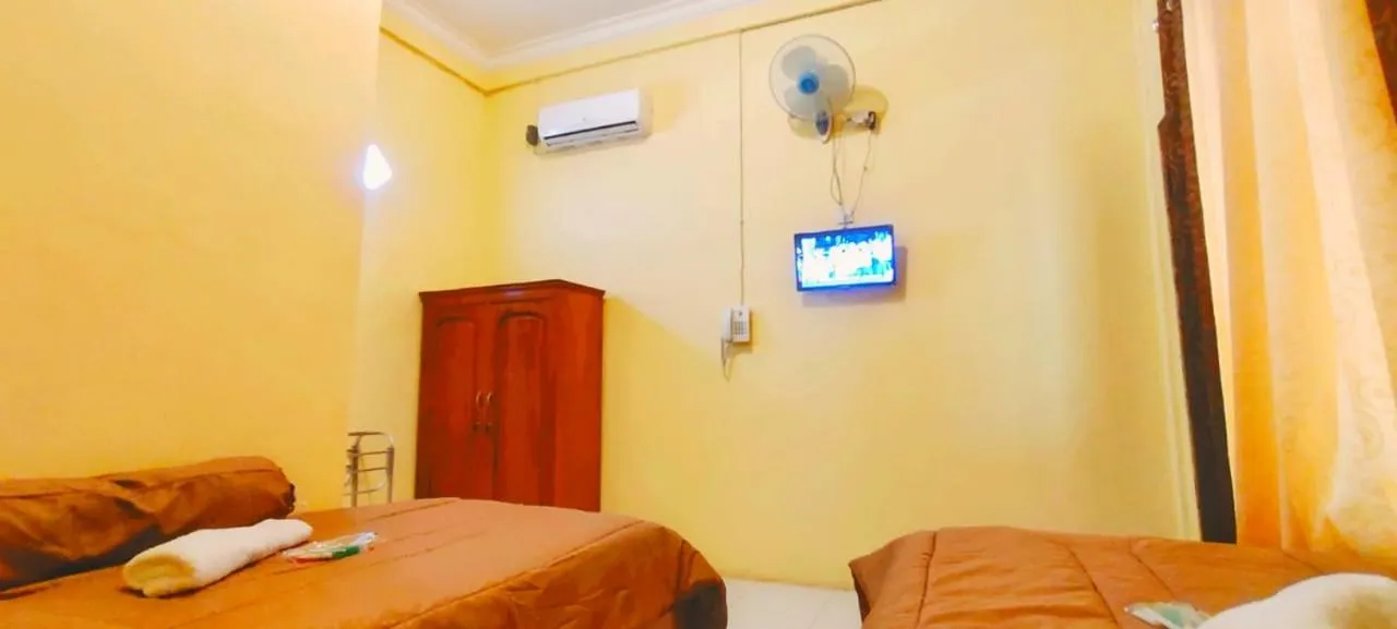 Bed in FIFAWIND HOTEL