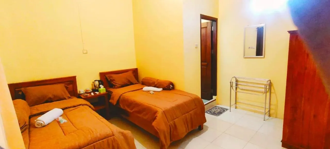 Bed in FIFAWIND HOTEL