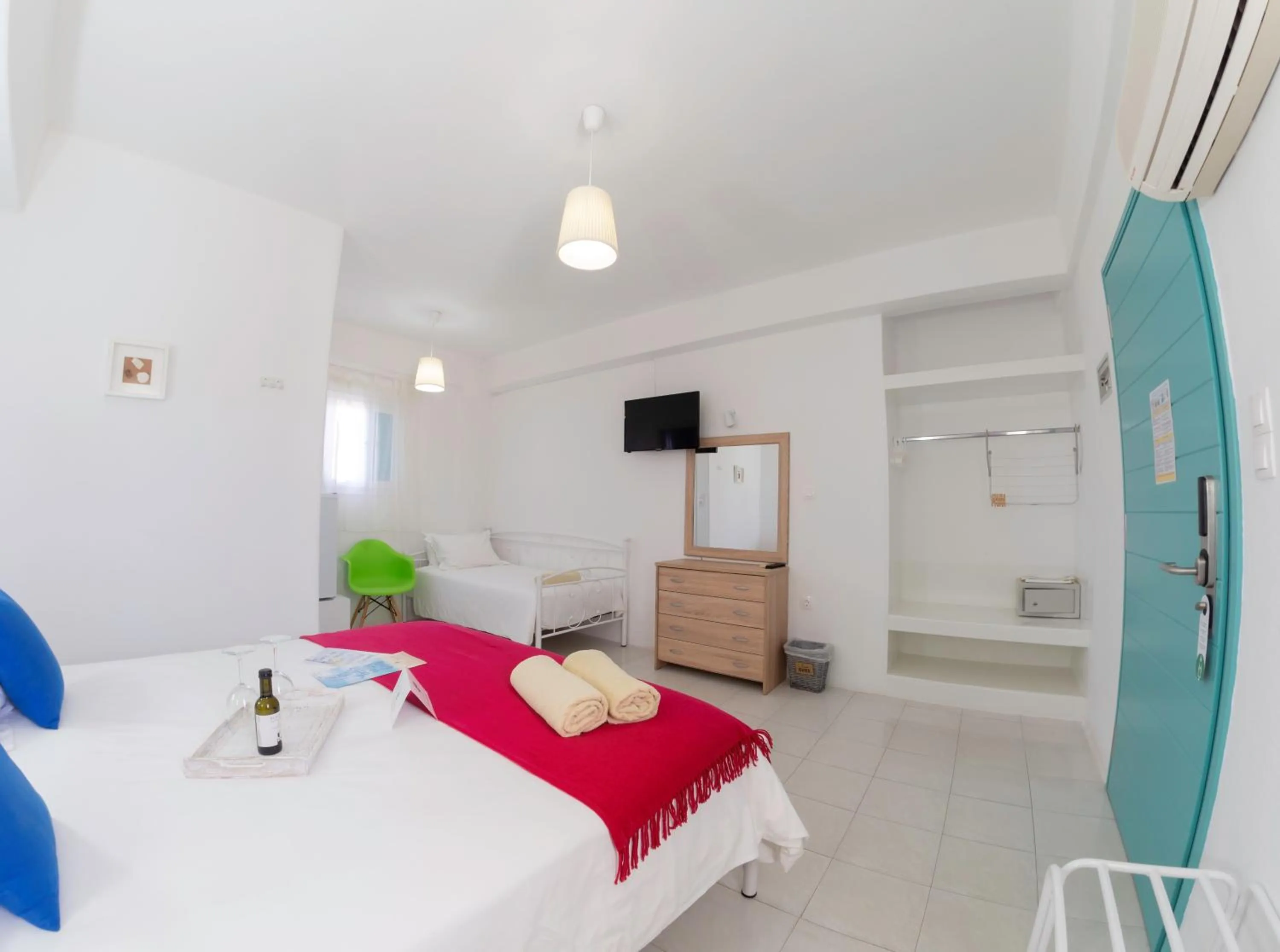 Bed in Amaryllis Beach Hotel