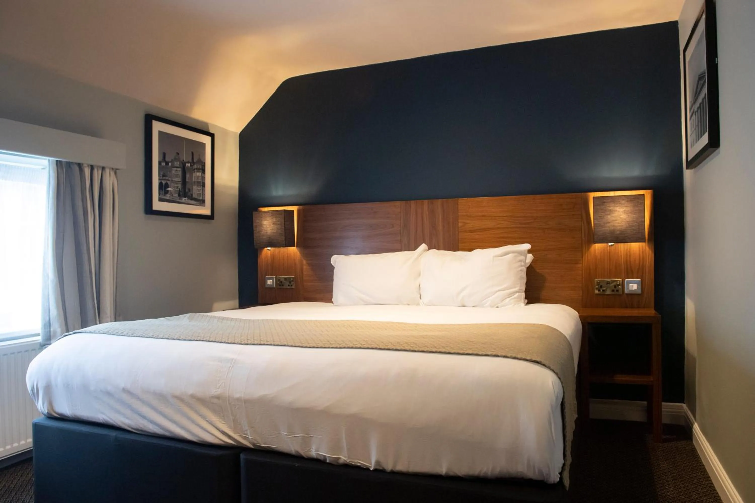 Bed in The White Hart by Innkeeper's Collection