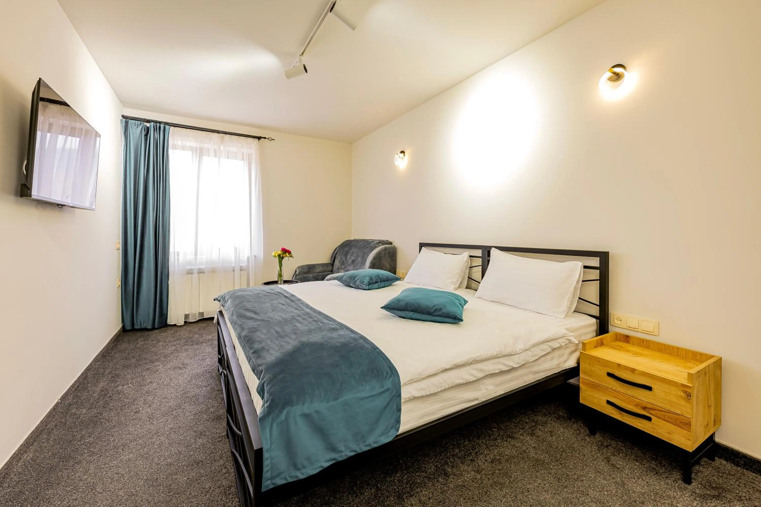 Bed in ARSIS Family Hotel