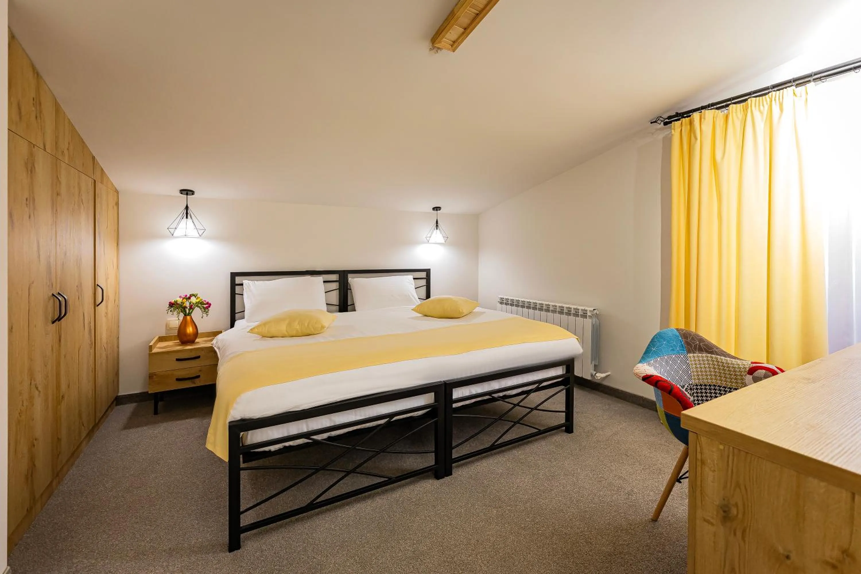 Bed in ARSIS Family Hotel