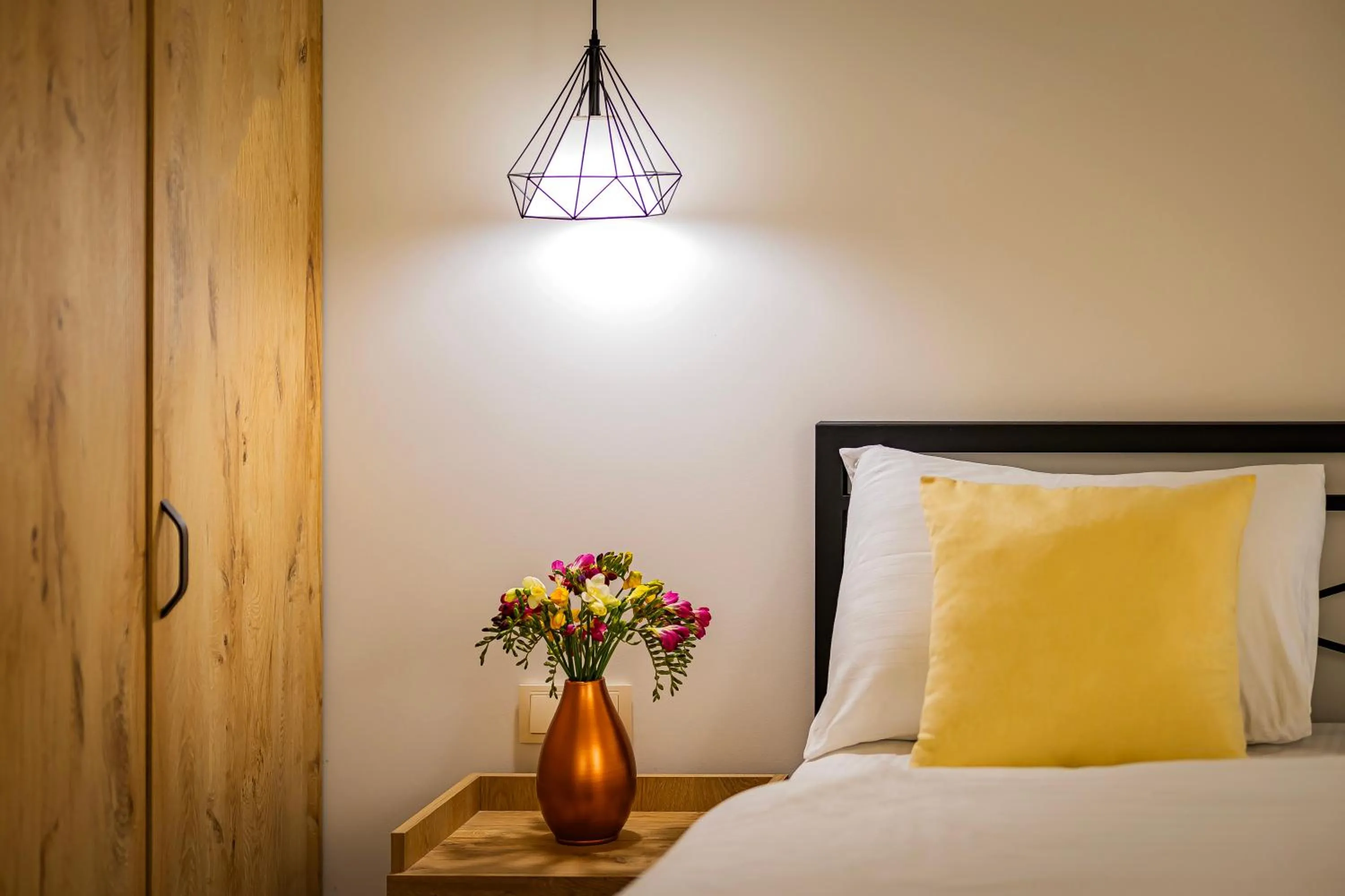 Bed in ARSIS Family Hotel