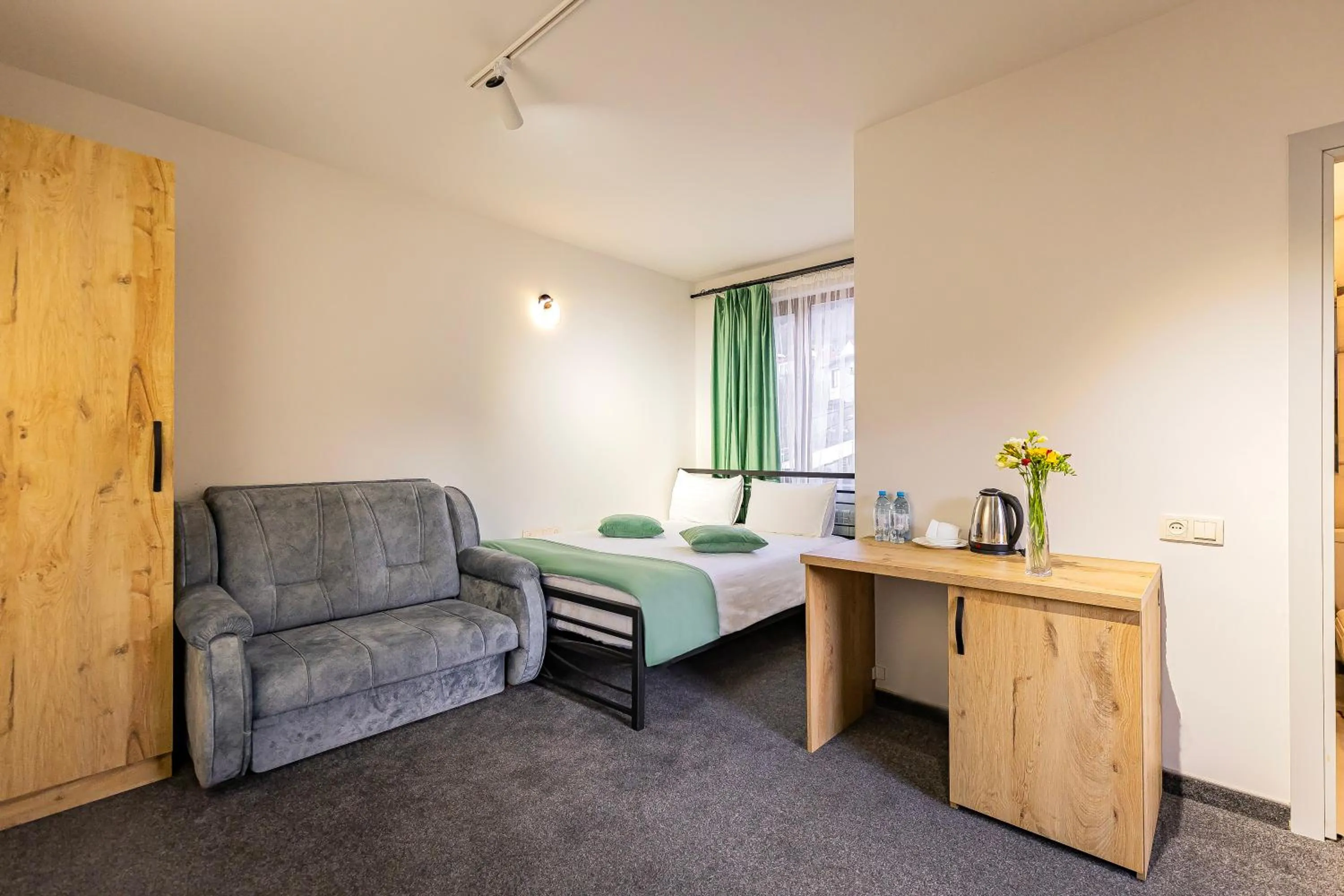 Bed in ARSIS Family Hotel