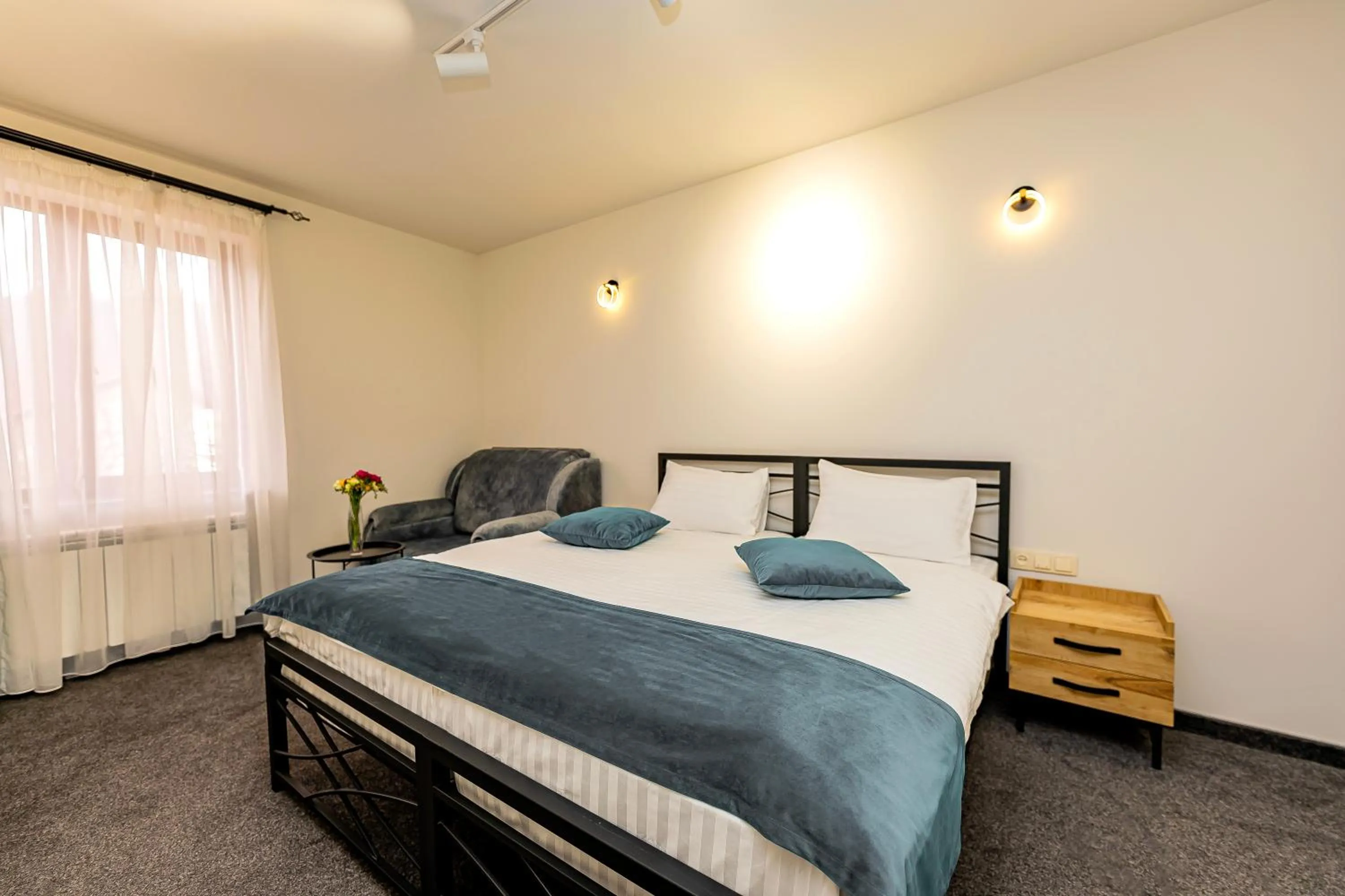 Bed in ARSIS Family Hotel