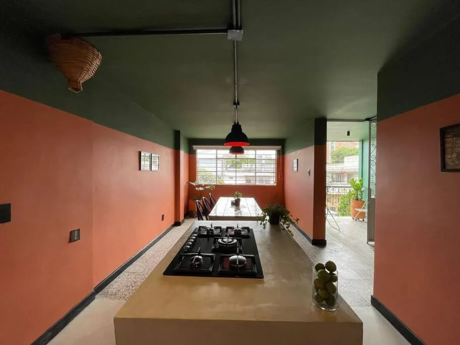 Kitchen or kitchenette, Bed in La Bonita Guesthouse