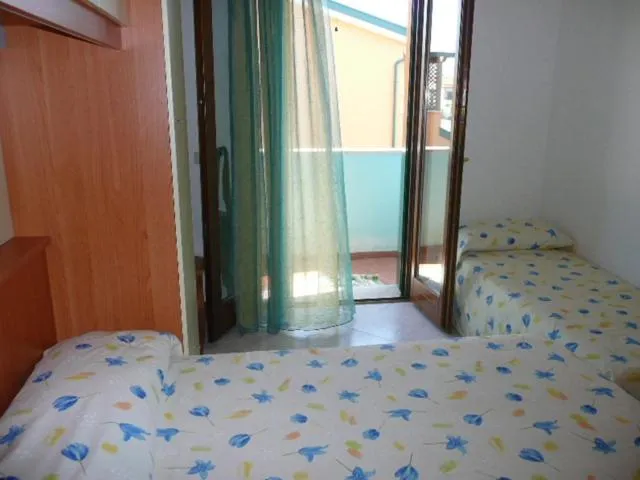 Bedroom, Bed in Villaggio Cristina 2 - Agenzia Cocal