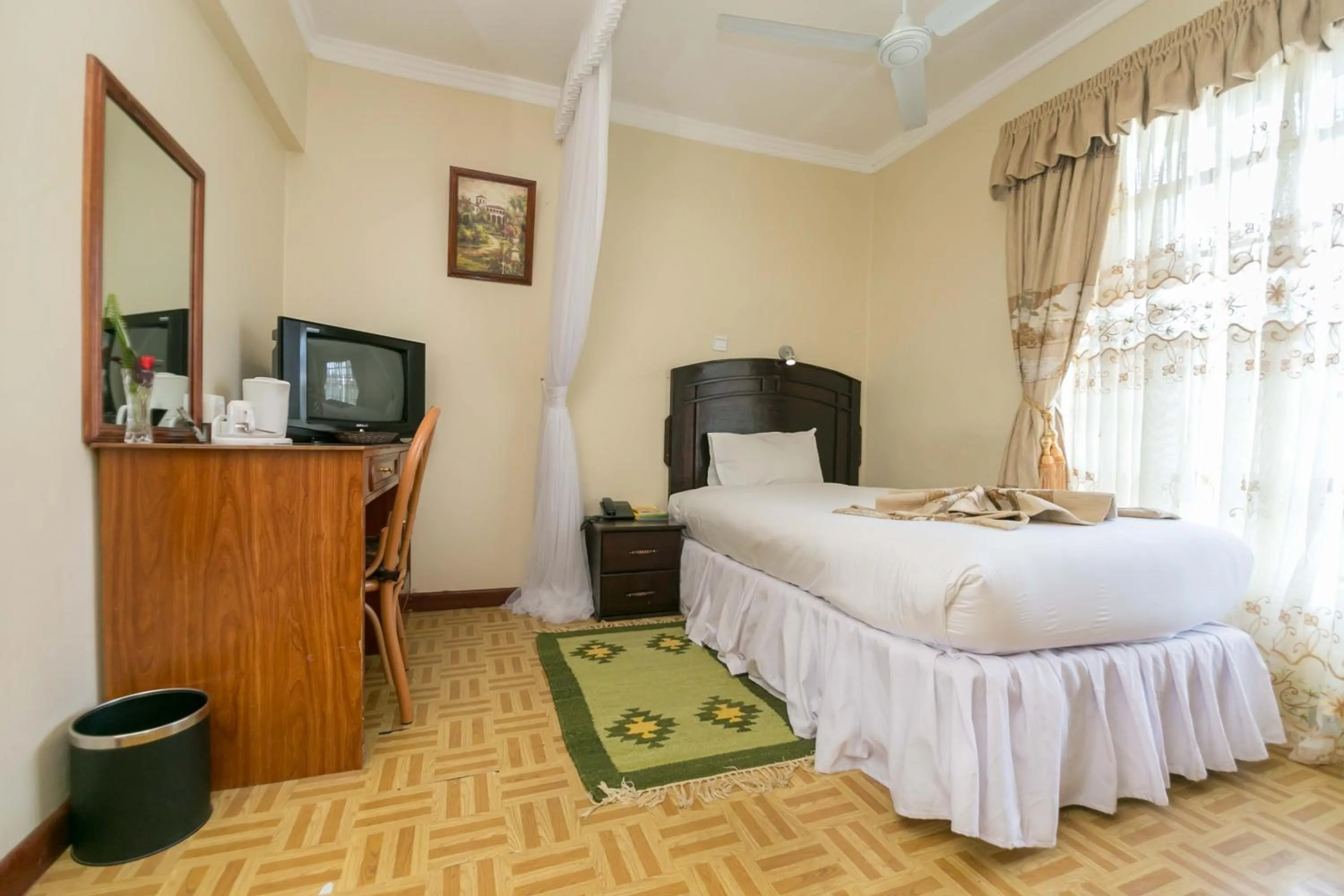 Photo of the whole room, Bed in Fahari Gardens Hotel