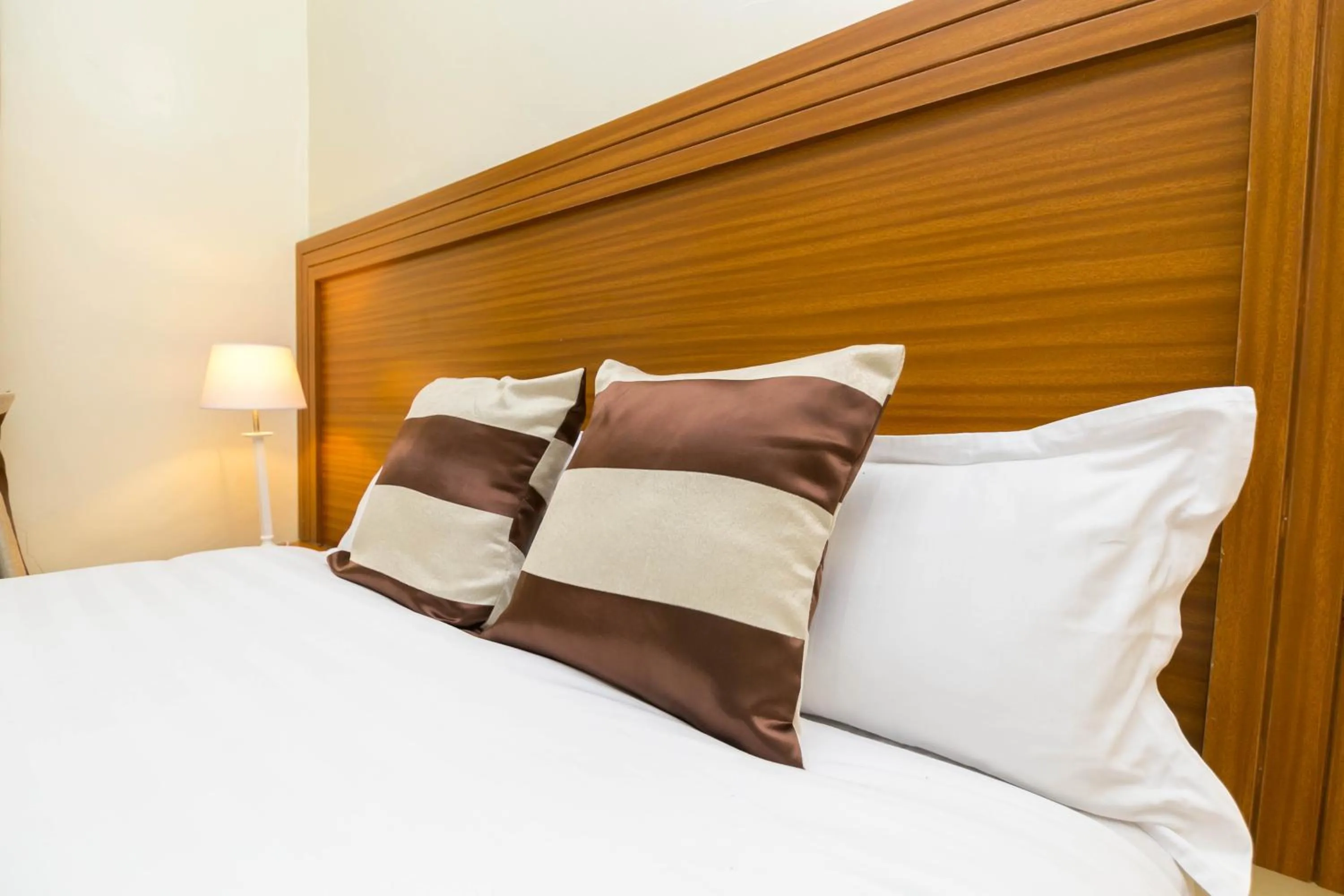 Bed in Fahari Gardens Hotel