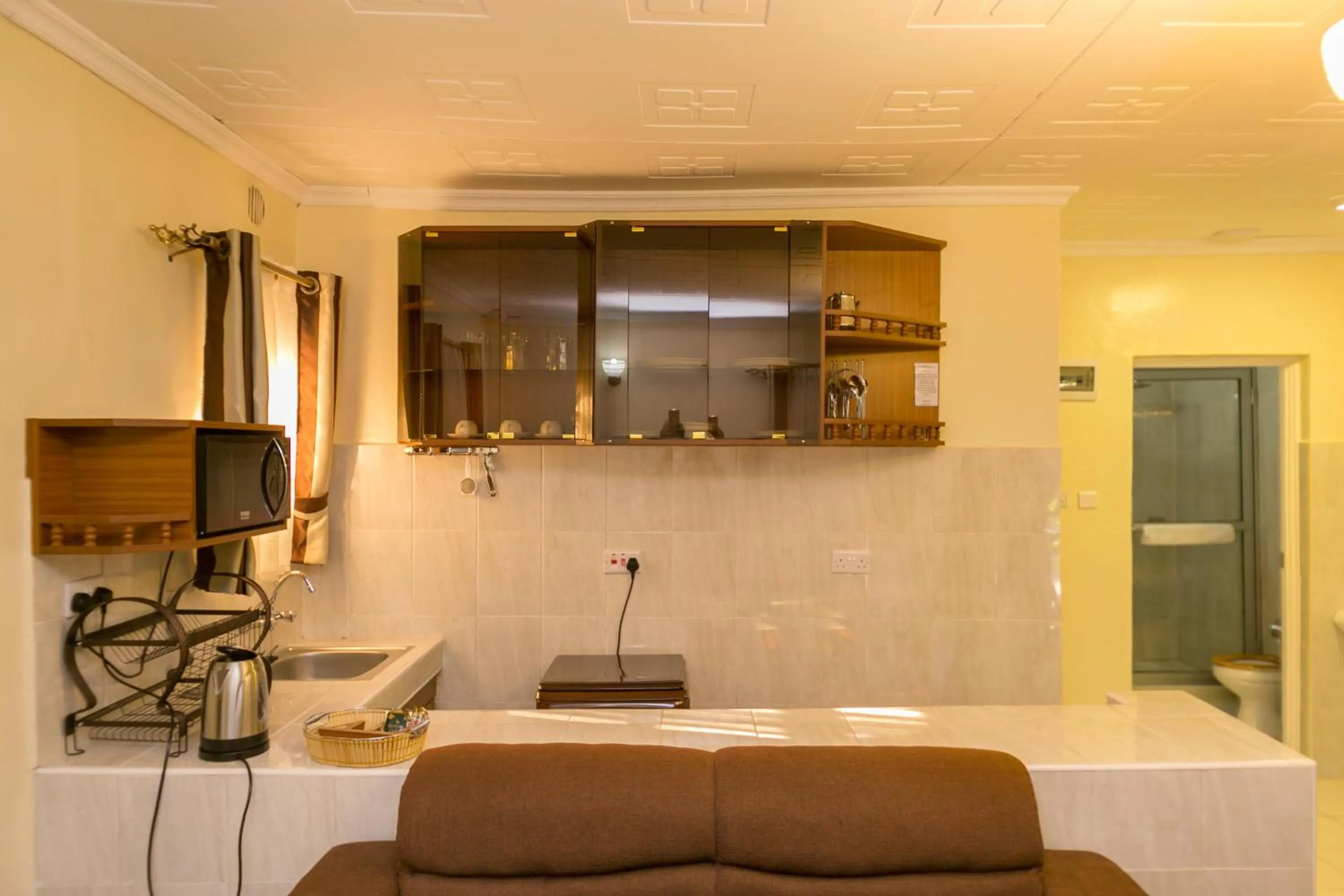 Kitchen or kitchenette in Fahari Gardens Hotel