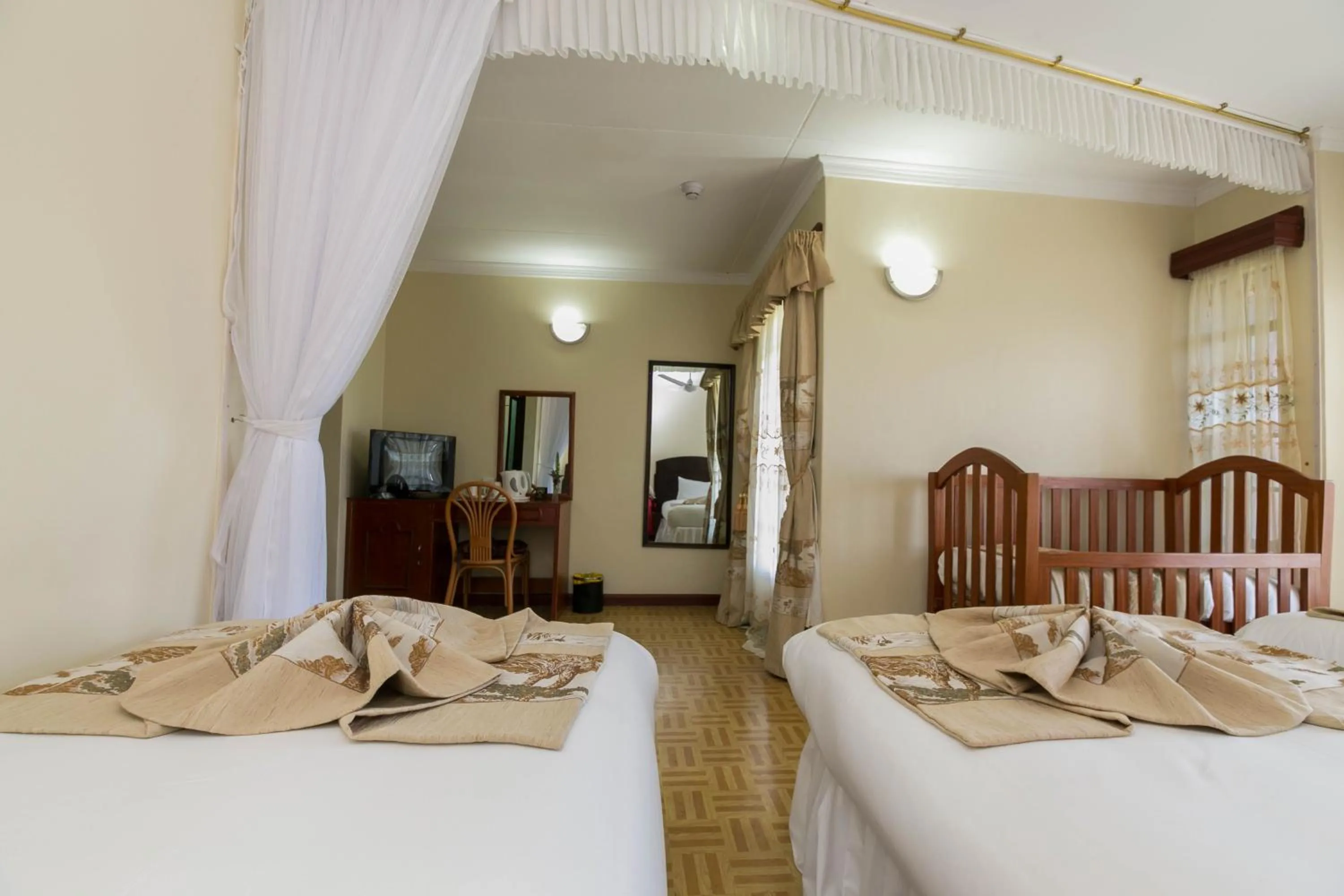 Photo of the whole room, Bed in Fahari Gardens Hotel