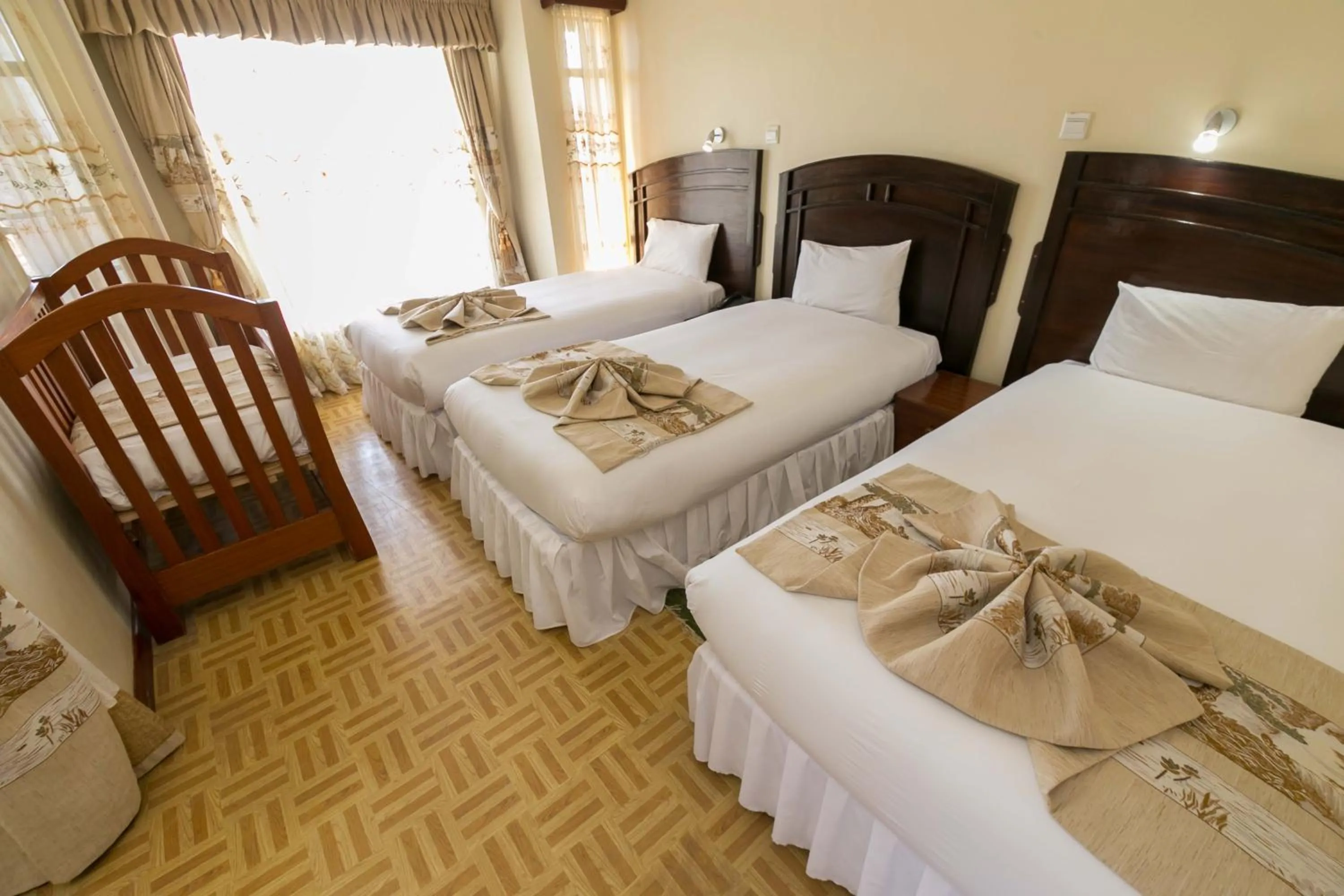 Photo of the whole room, Bed in Fahari Gardens Hotel