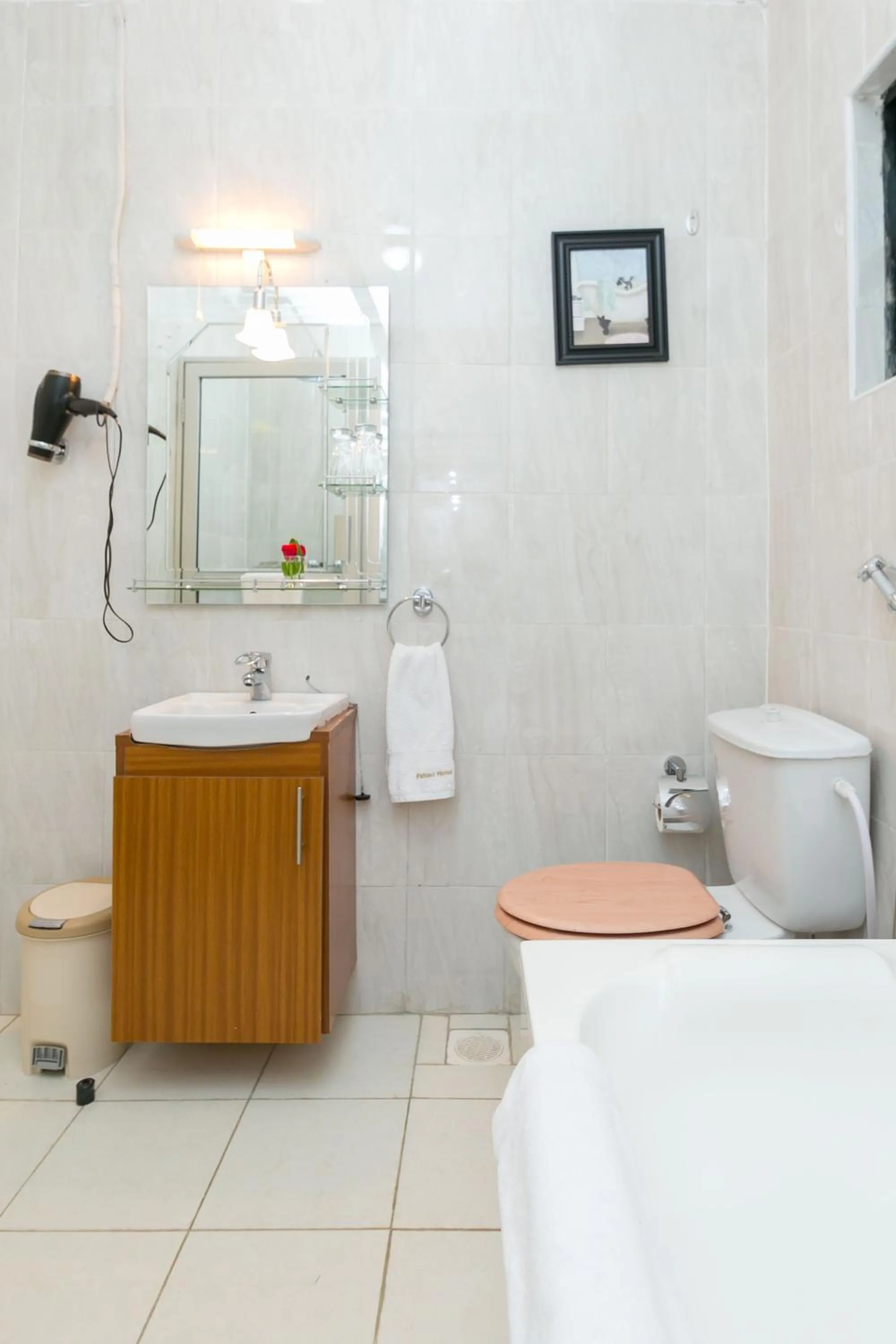 Bathroom, Bed in Fahari Gardens Hotel