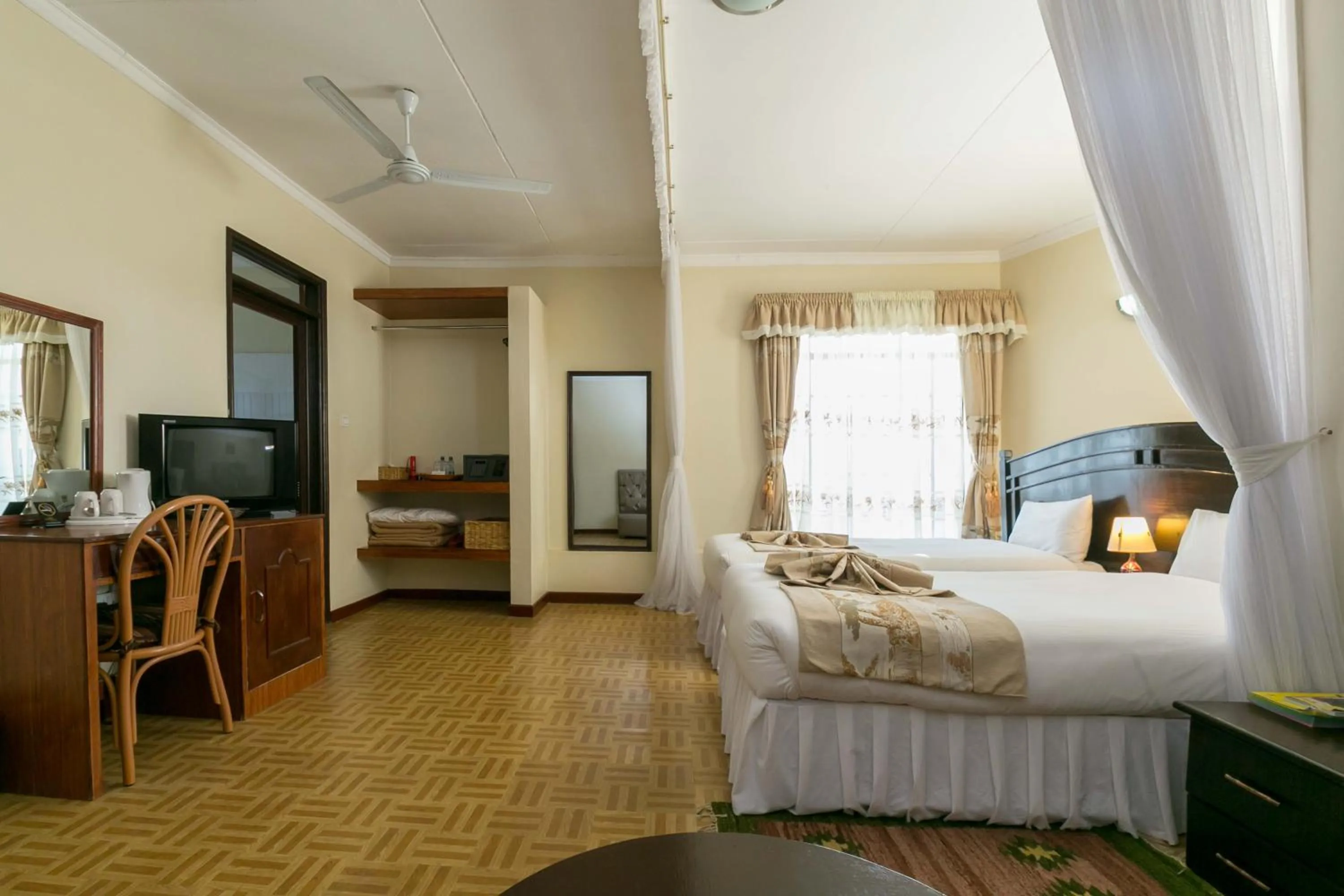 Photo of the whole room, Bed in Fahari Gardens Hotel