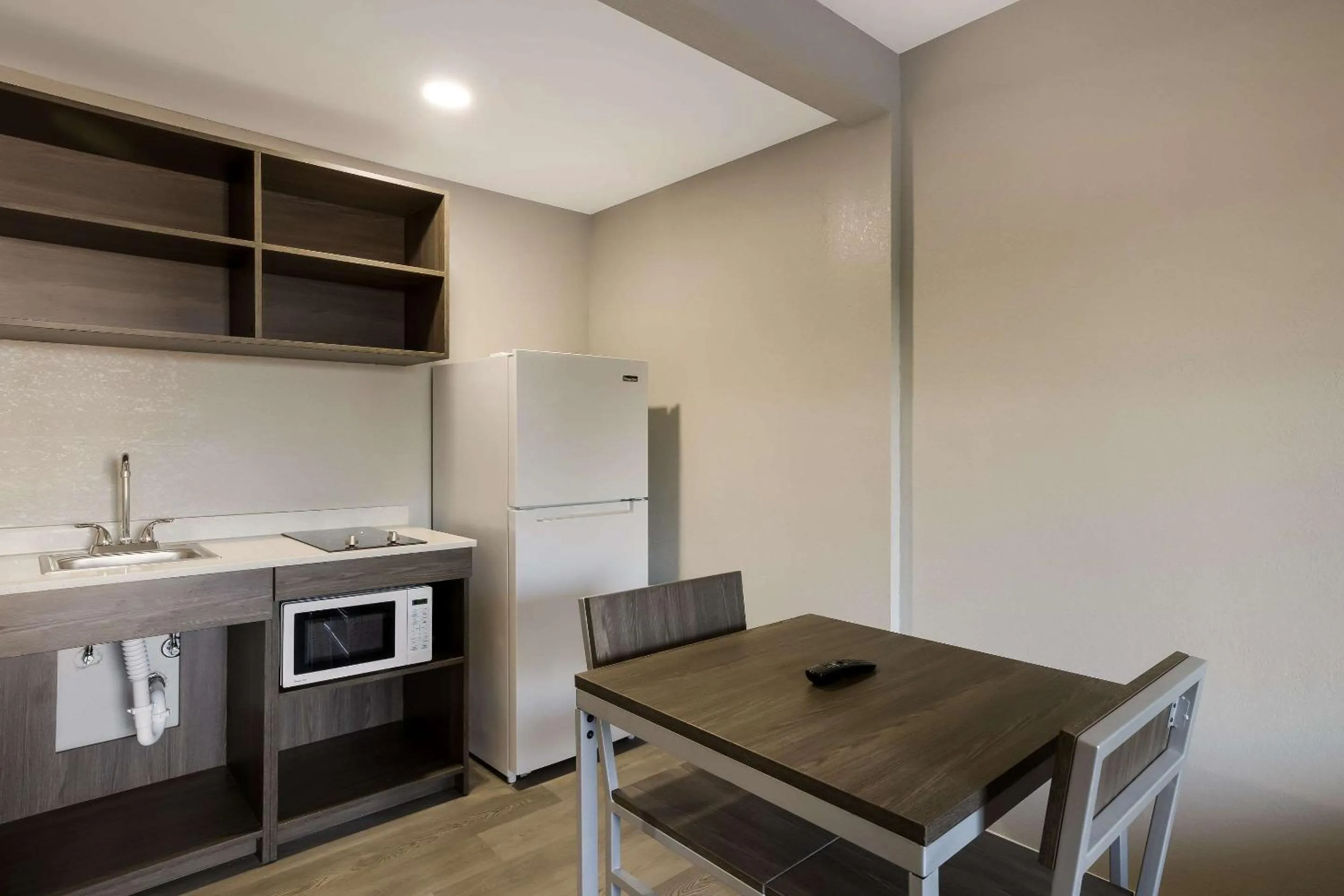 Bedroom in Suburban Studios Milwaukee Airport