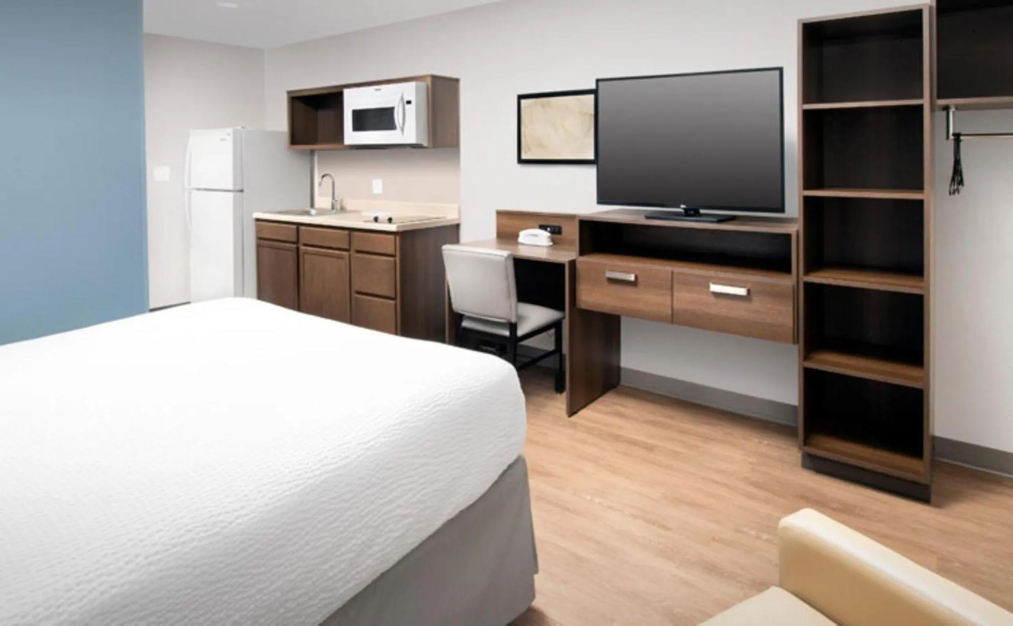 Bed in WoodSpring Suites Orlando East UCF