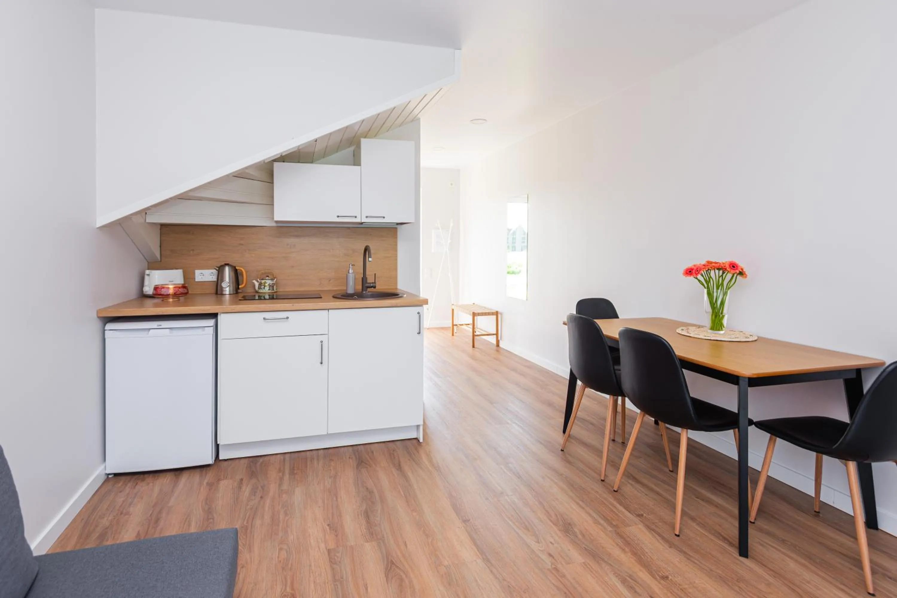 Dining area in KUTI apartamentai