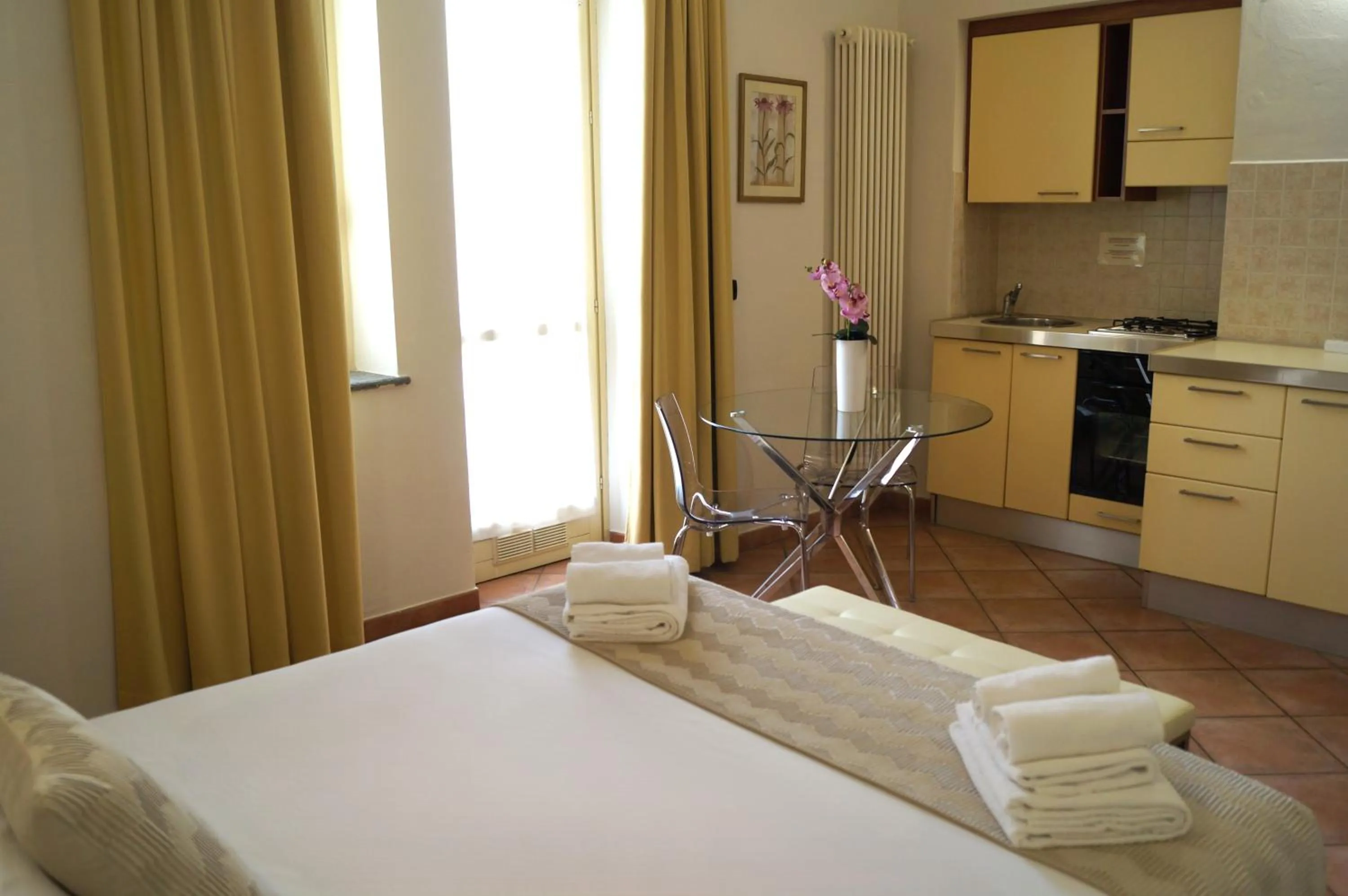 Bed in Loger Confort Residence & Apartments