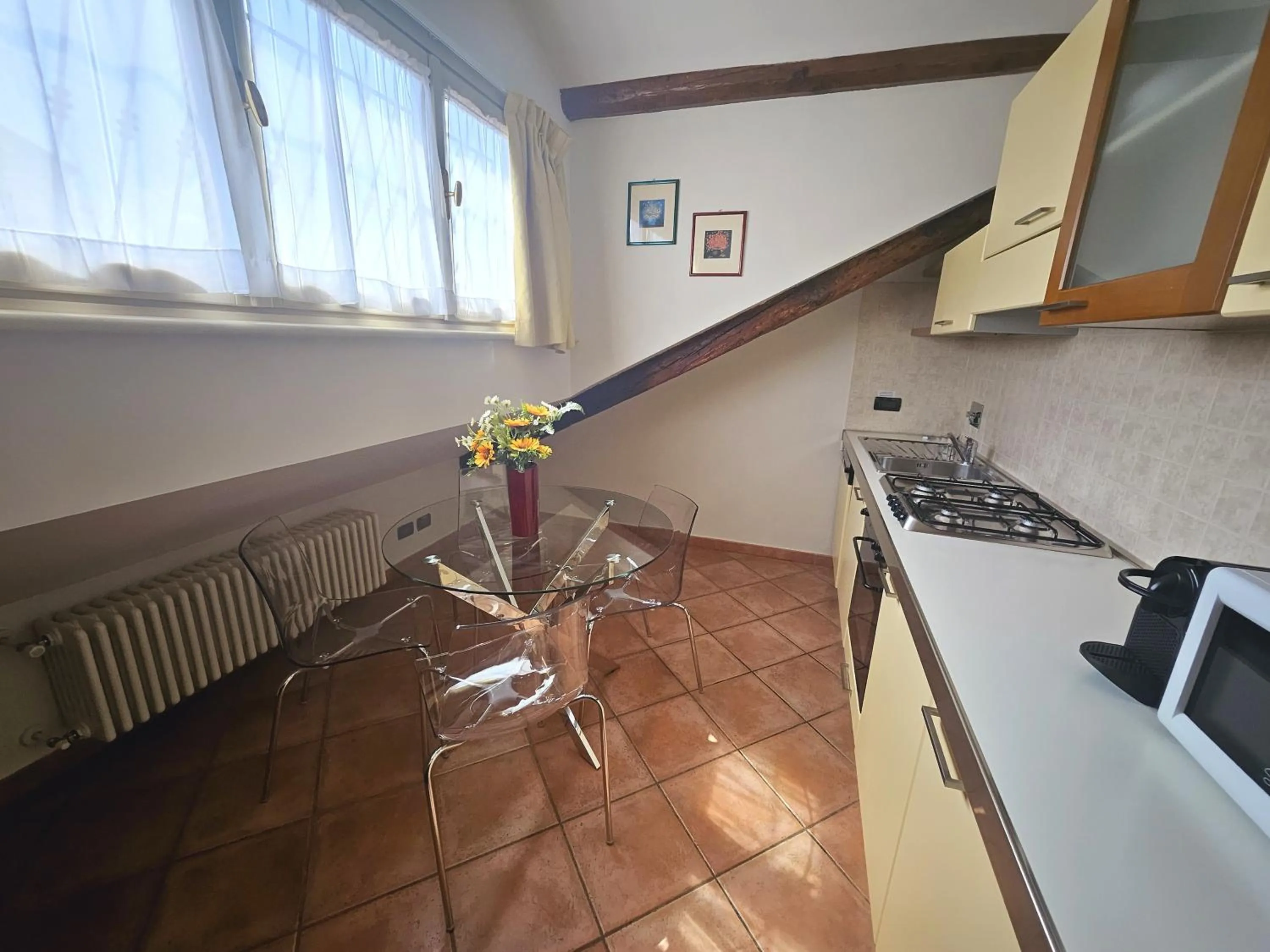 Kitchen or kitchenette in Loger Confort Residence & Apartments