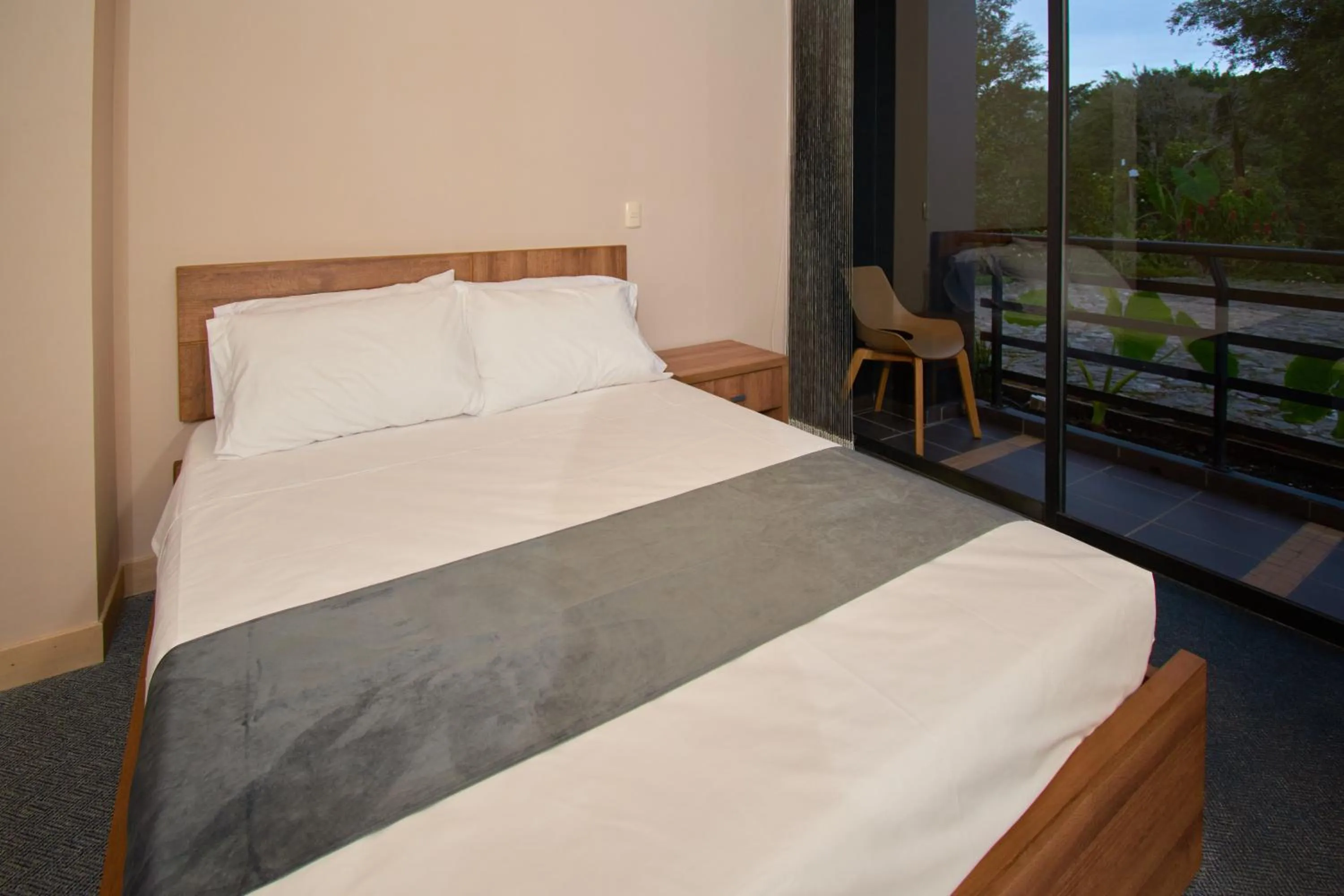 Bed in Kokumi by Bernalo Hotels