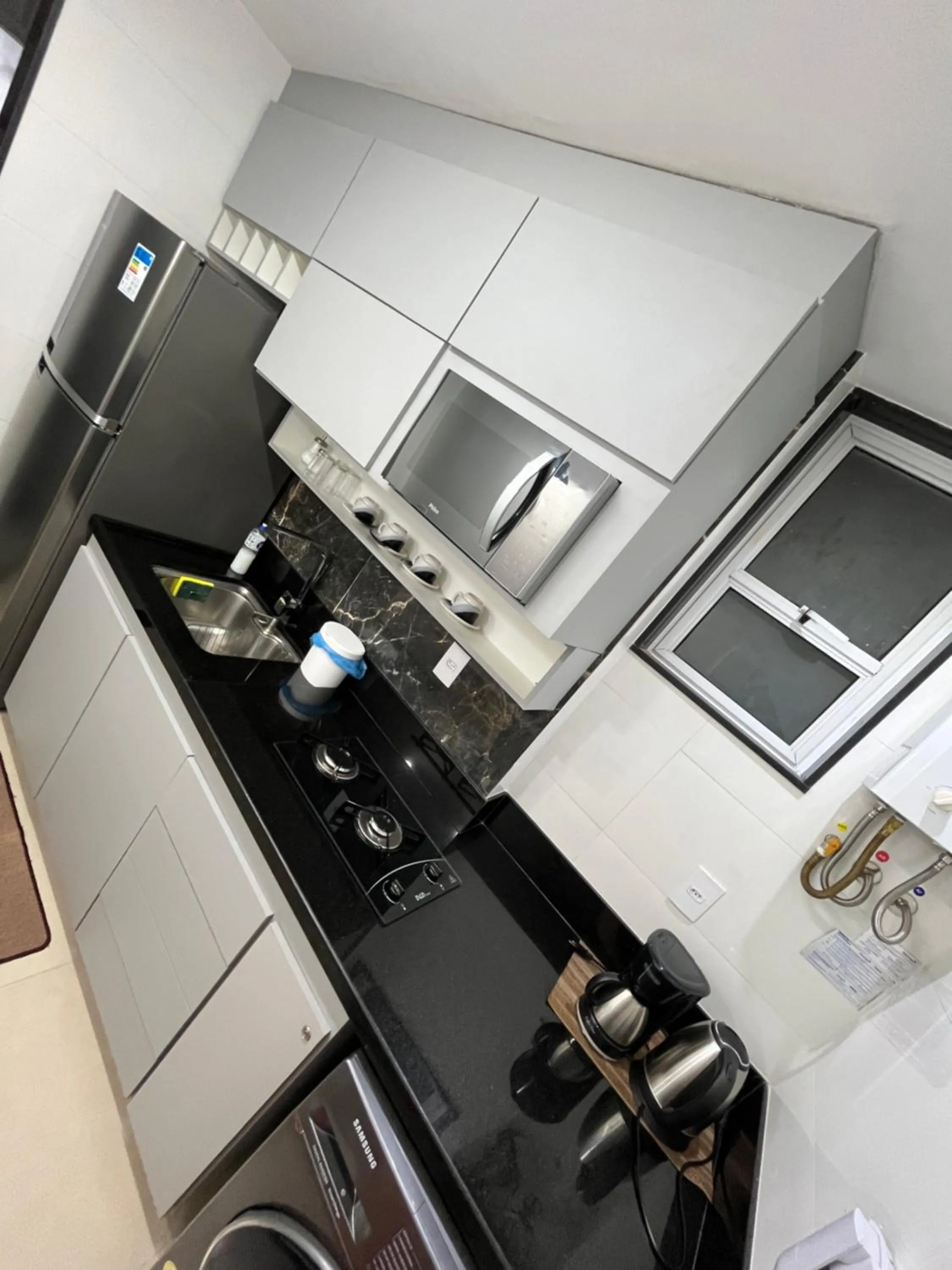 Kitchen or kitchenette in Apartamento em Copacabana
