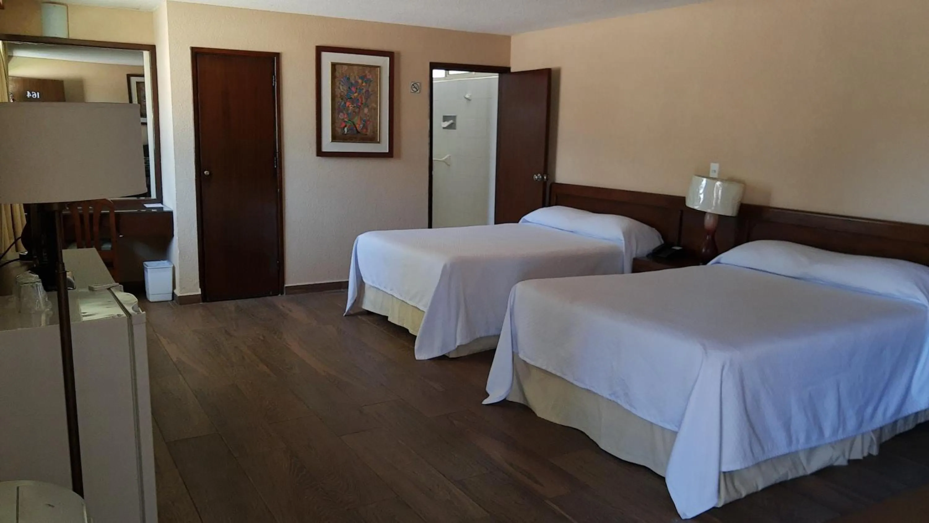 Bed in Hotel Las Palmas Midway Inn