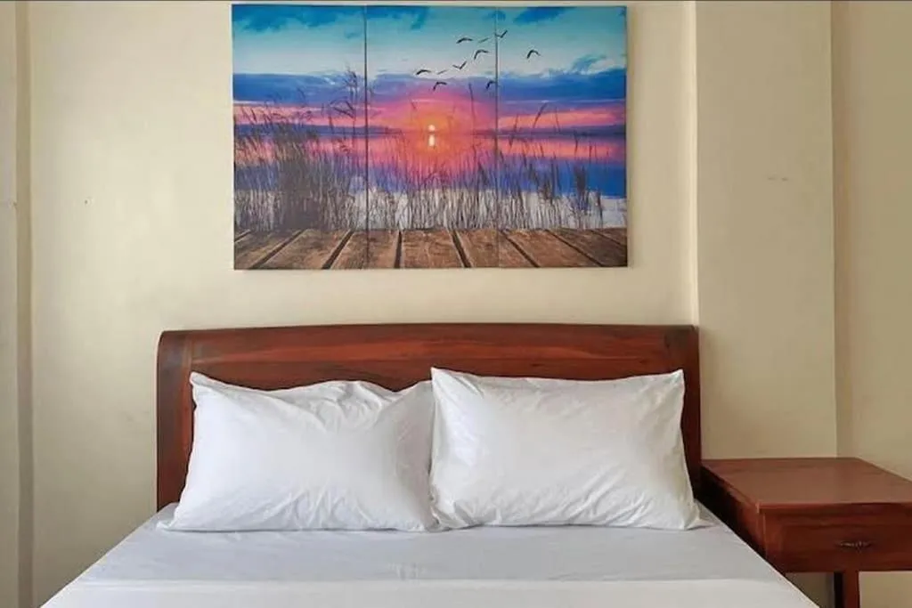 Bed in Lawton Residences Studio Room 2G
